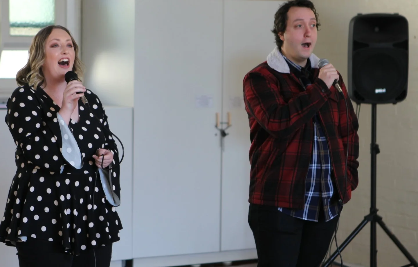 Madeline Clark and Dave McCarthie performing duet at student concert in Richmond 