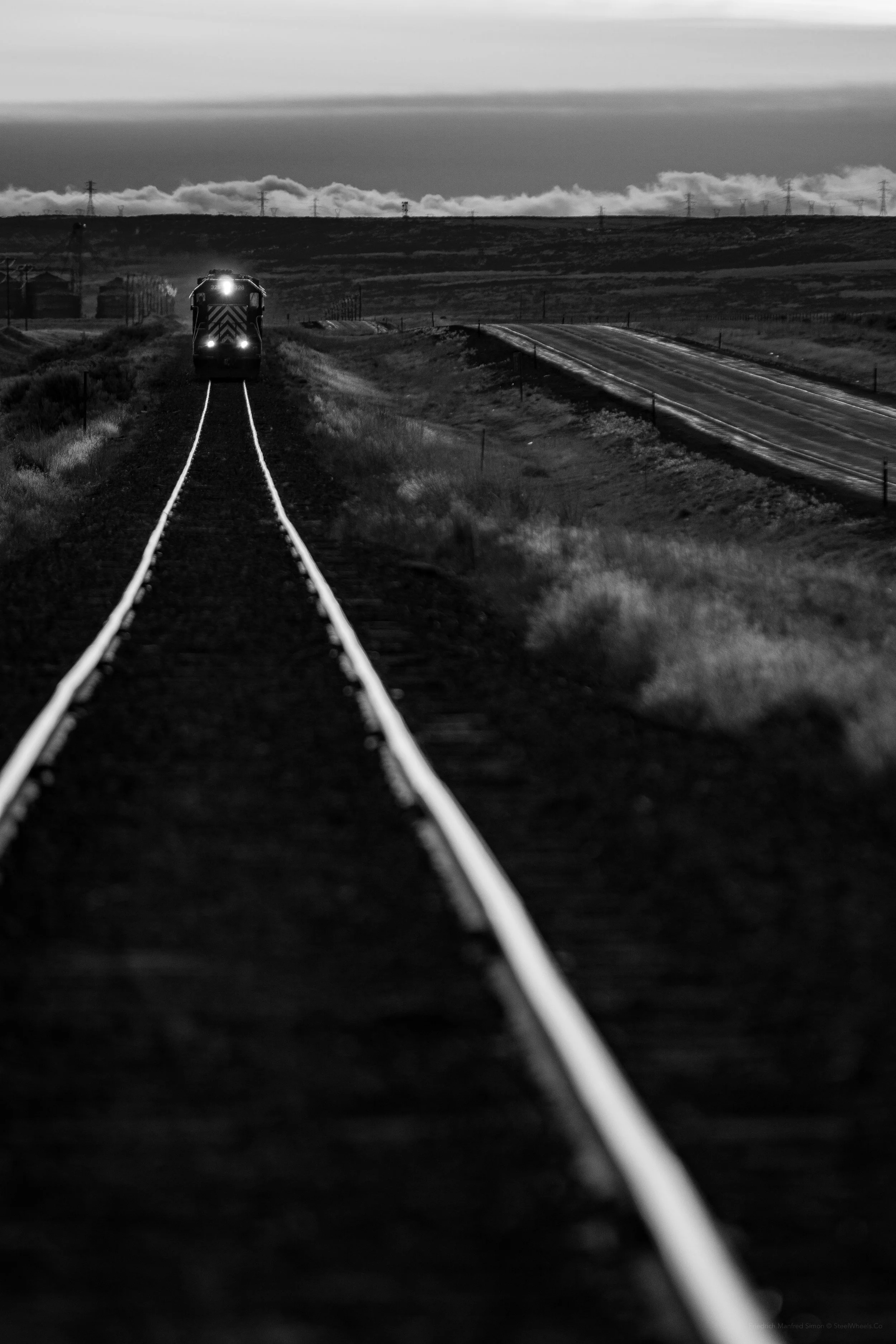 Scoot Train heading east along Highway 2 near Cement