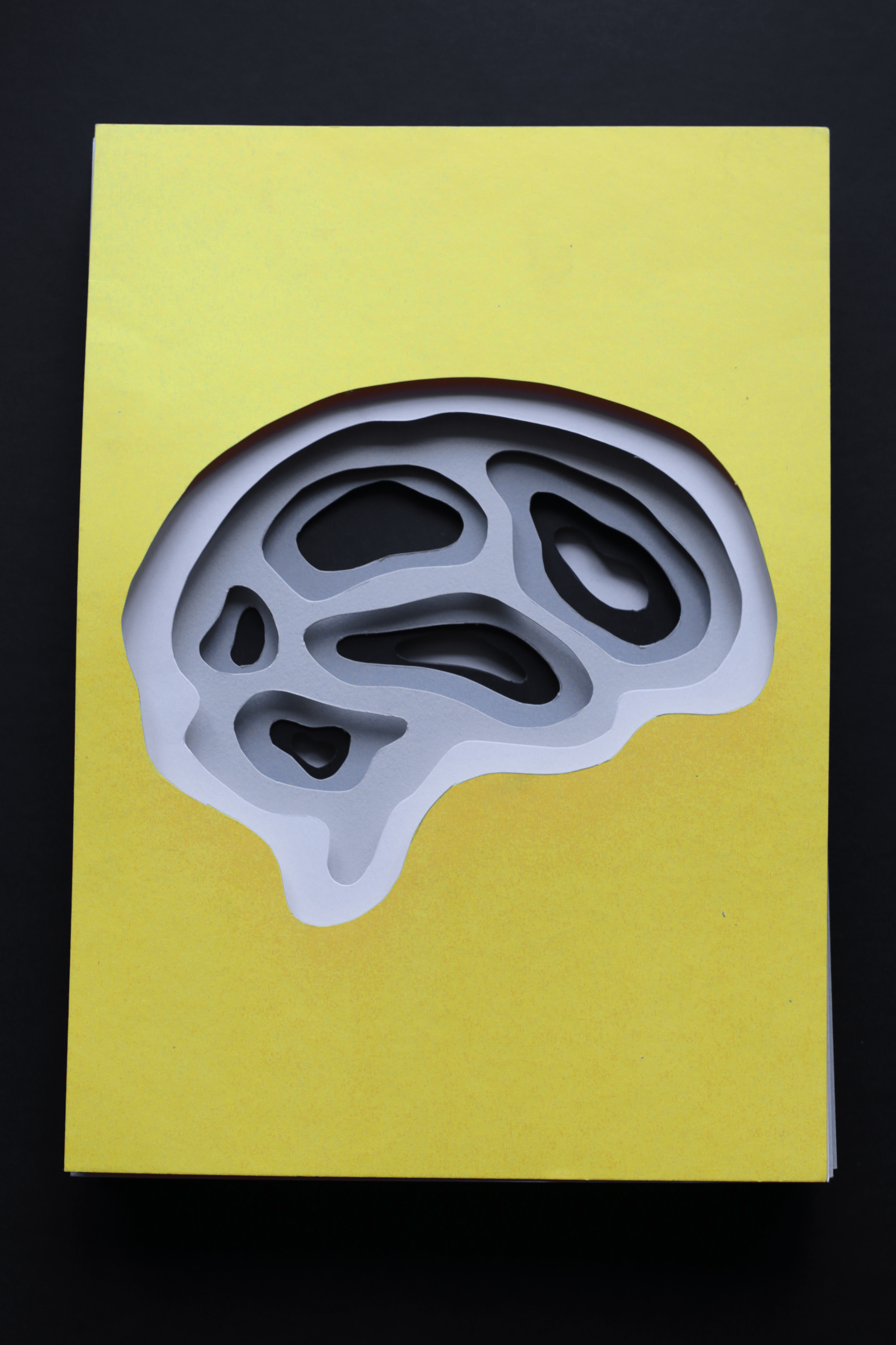 Coloured card was hand-cut and then photographed to create the final look.