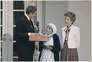 Admire yes, but also follow Mother Teresa's example