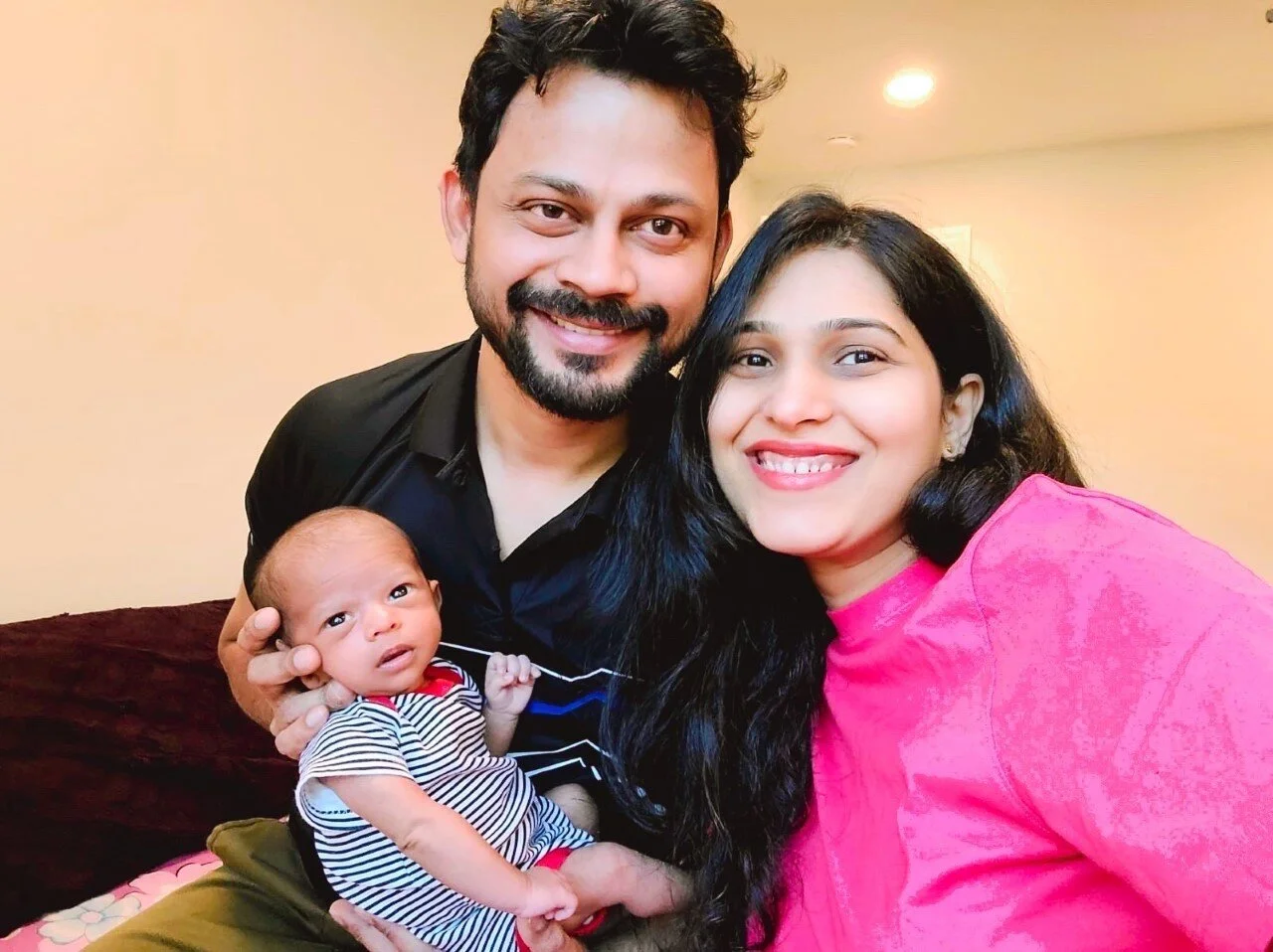 first time parents Govind and Barnali with their newborne Kian. (photo courtesy - Barnali)