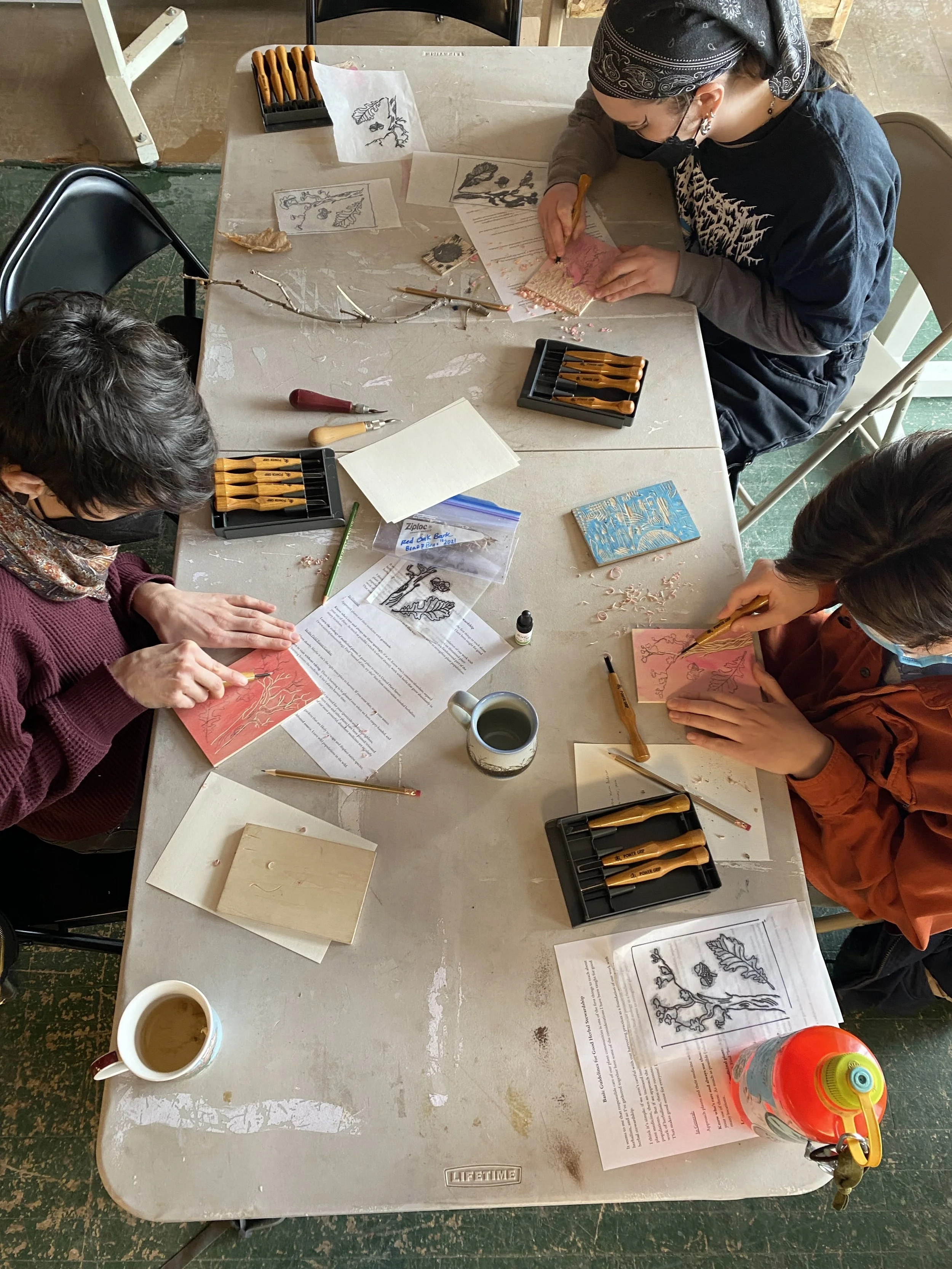 Oak class students carving.JPG