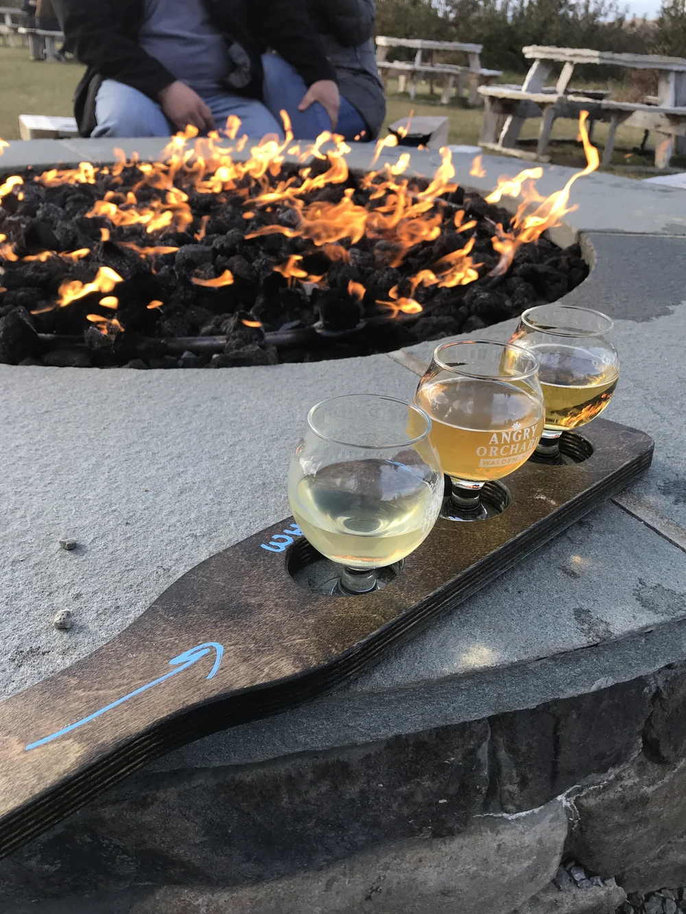 Angry Orchard Samples and fire pit.JPG