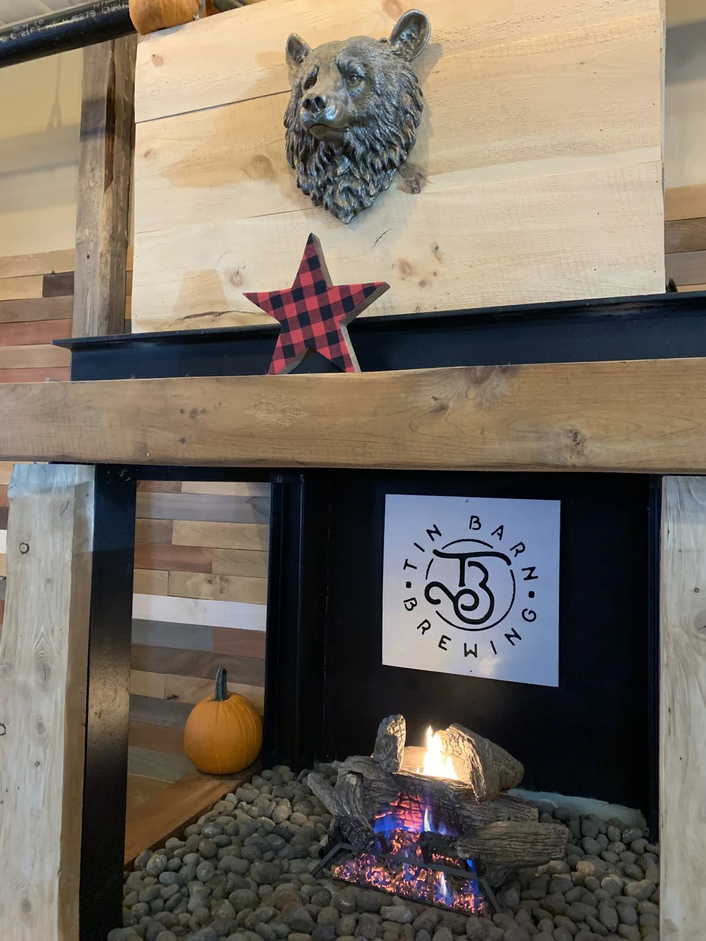 tin barn brewing fireplace.JPG