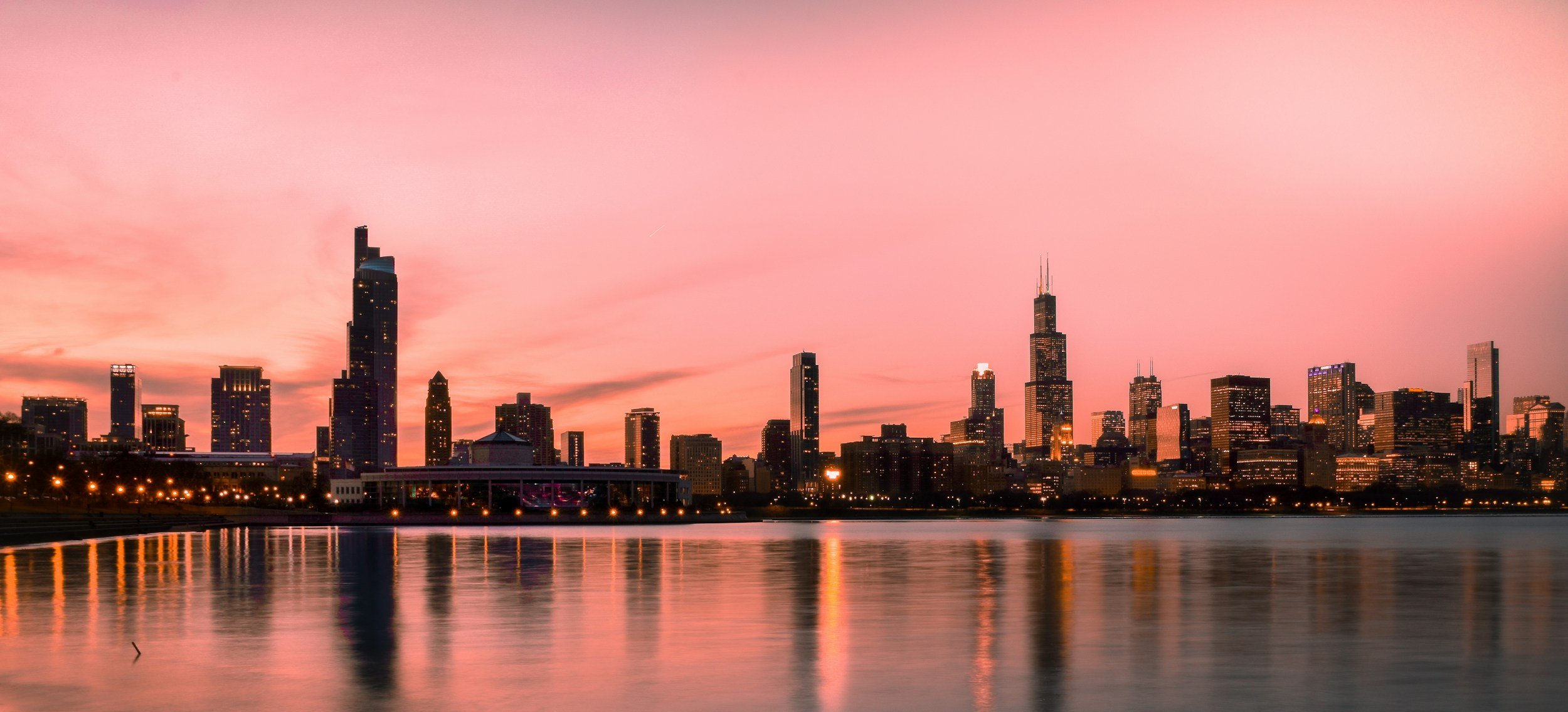 Chicago skyline at night showing the trauma, anxiety, and depression will alleviate and end when doing an EMDR intensive with Obsidian Counseling and Wellness in the northern suburbs of Chicago and telehealth for all of Illinois