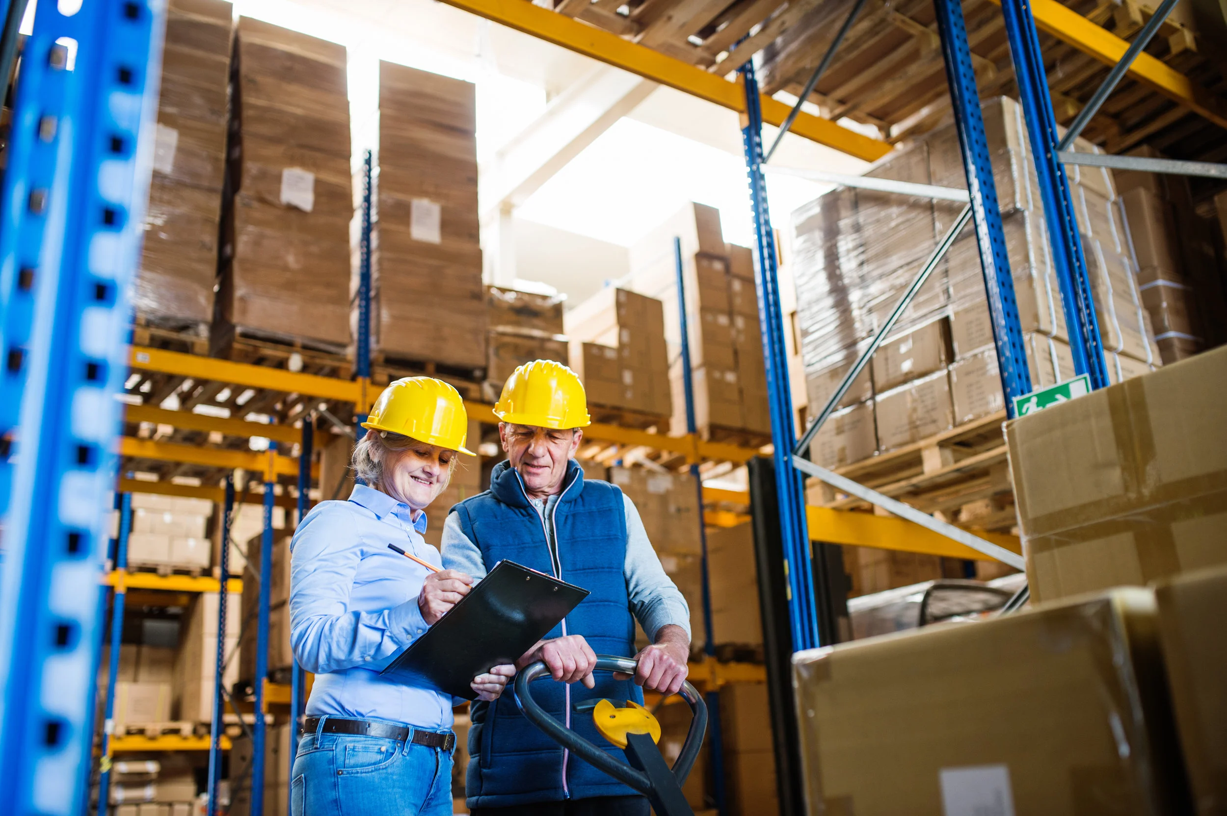 senior-woman-manager-and-man-worker-working-in-a-7R2UKBD.jpg