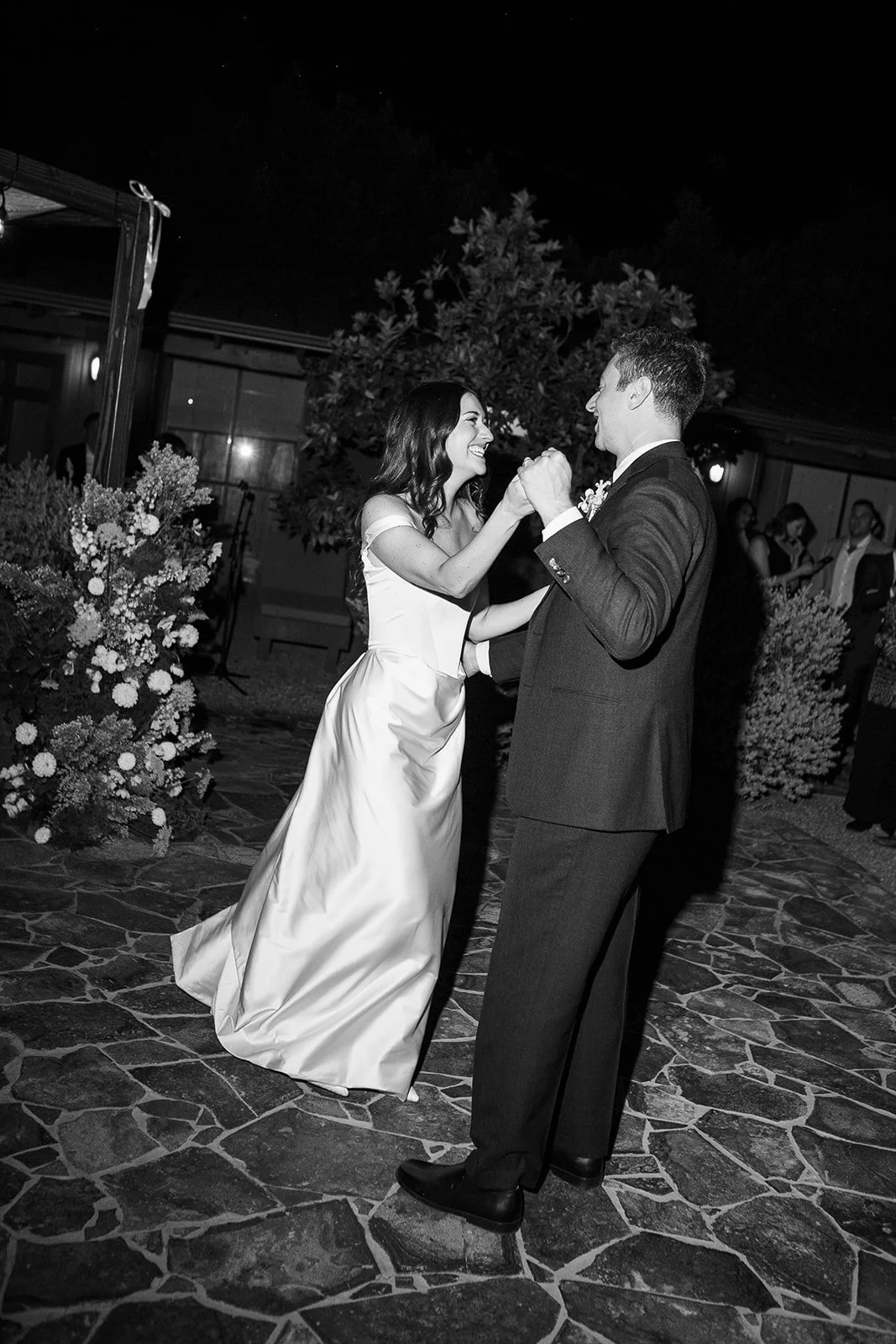 Bride and groom dancing together