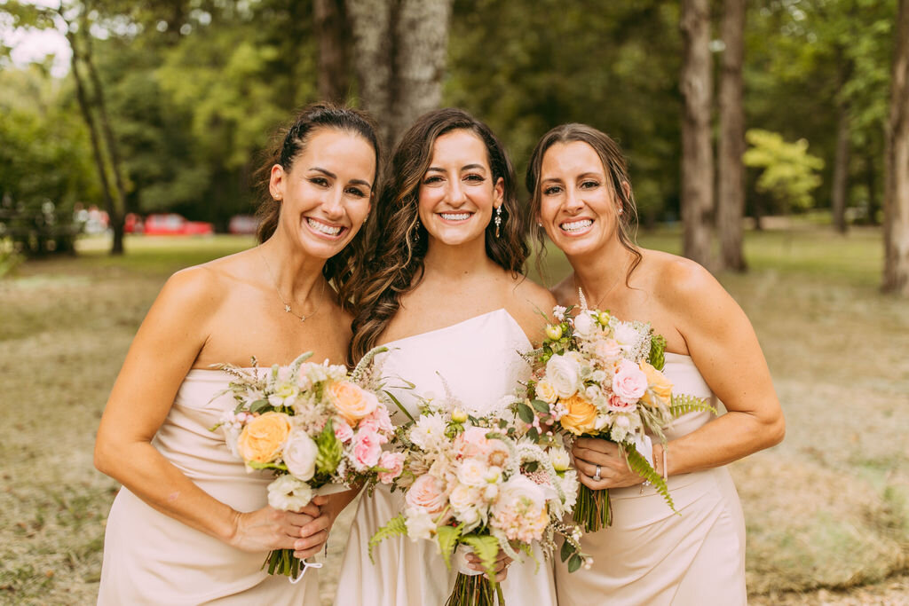 Bride being celebrated by her sisters