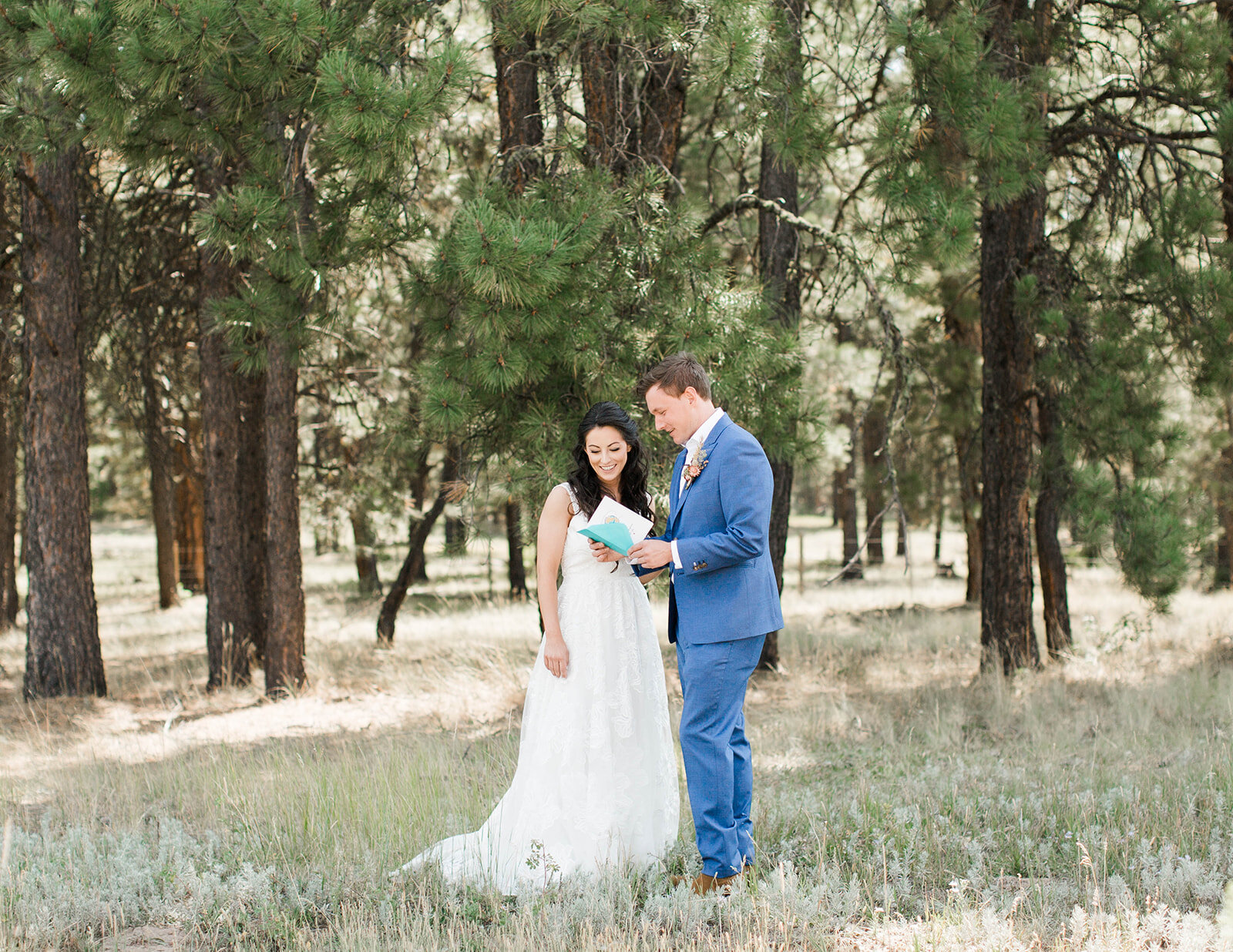 Modern Rustic Newly Weds Sharing Personal Vows before Mountain Wedding Ceremony