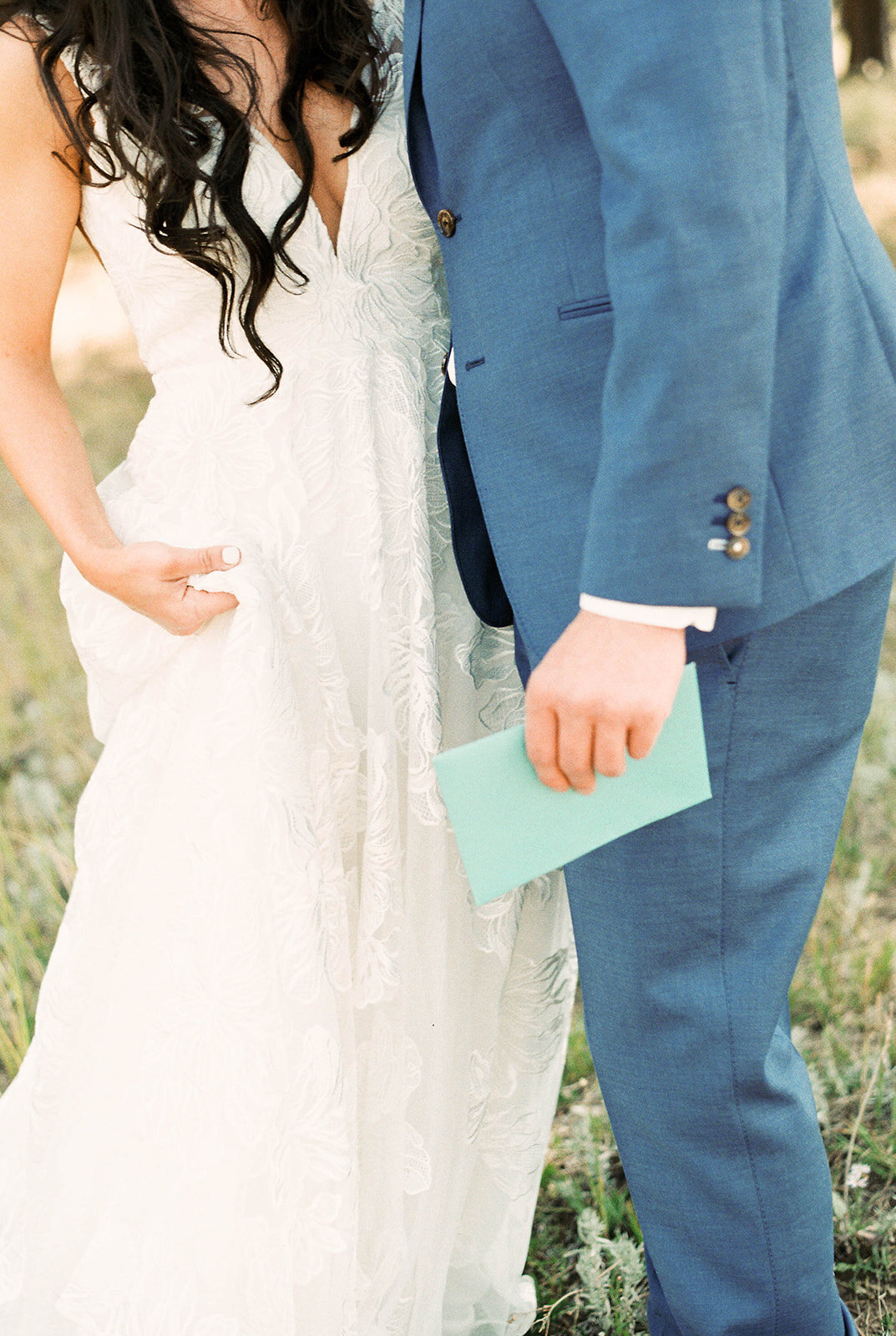 Modern Rustic Newly Weds Sharing Personal Vows before Mountain Wedding Ceremony