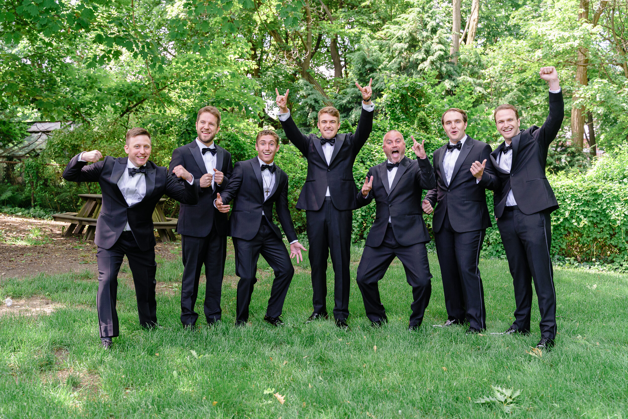 Groomsmen celebrating classic groom