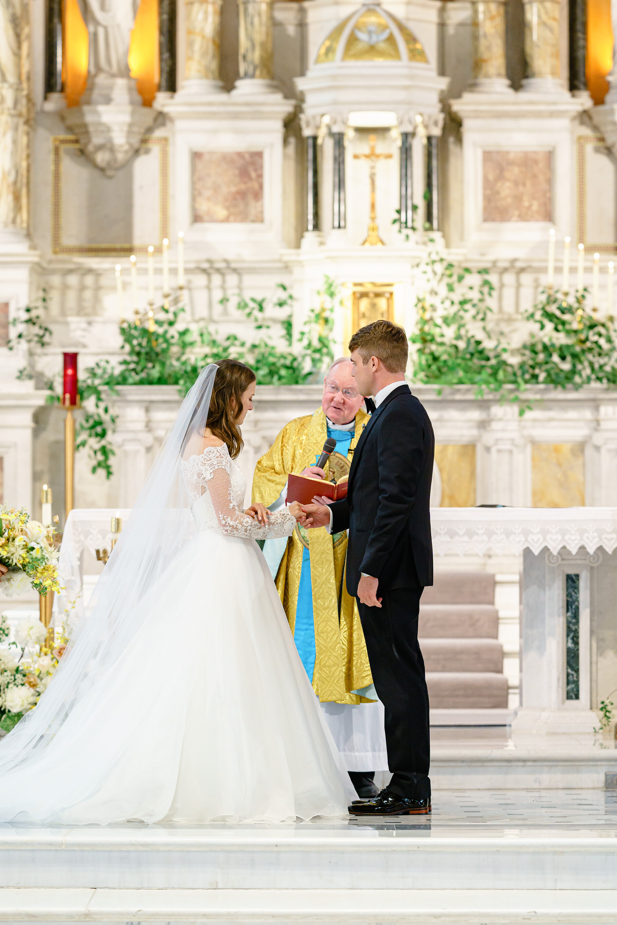 Timeless catholic couple at grand cathedral wedding