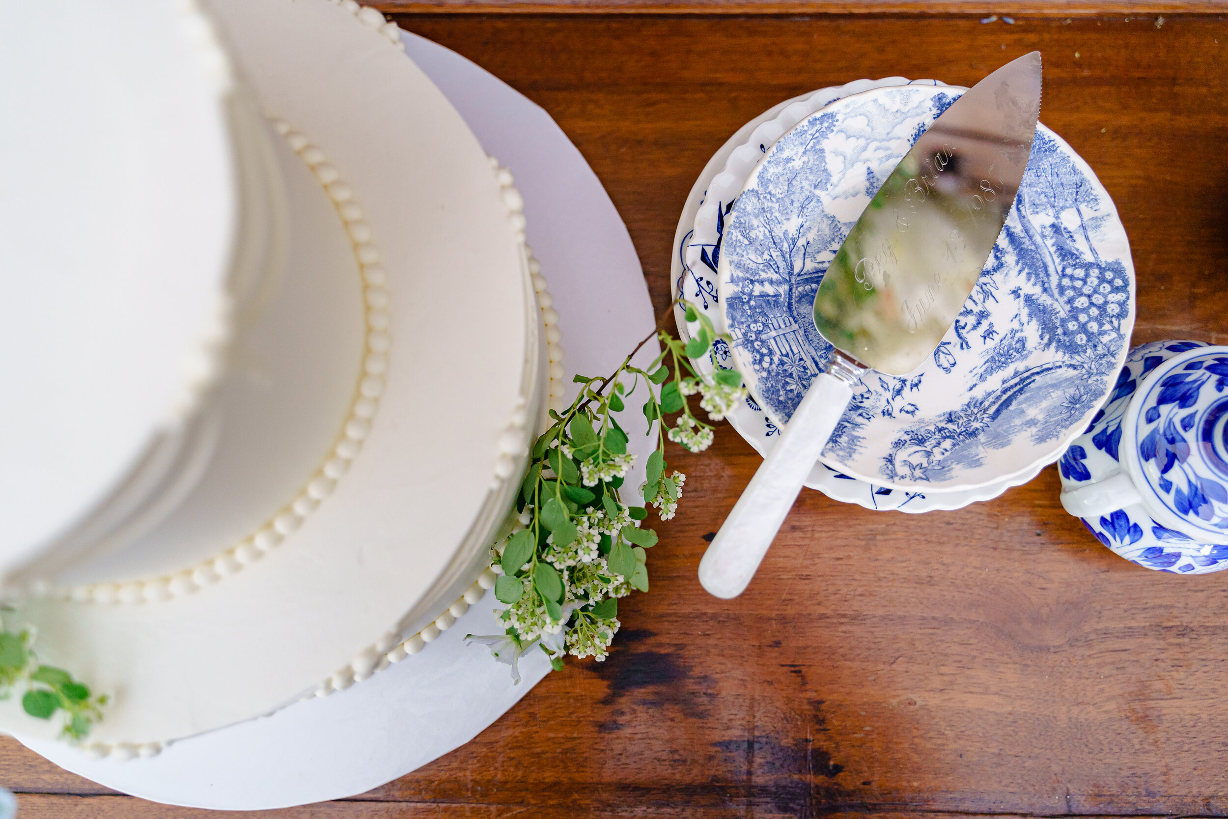 Classic wedding cake on timeless china