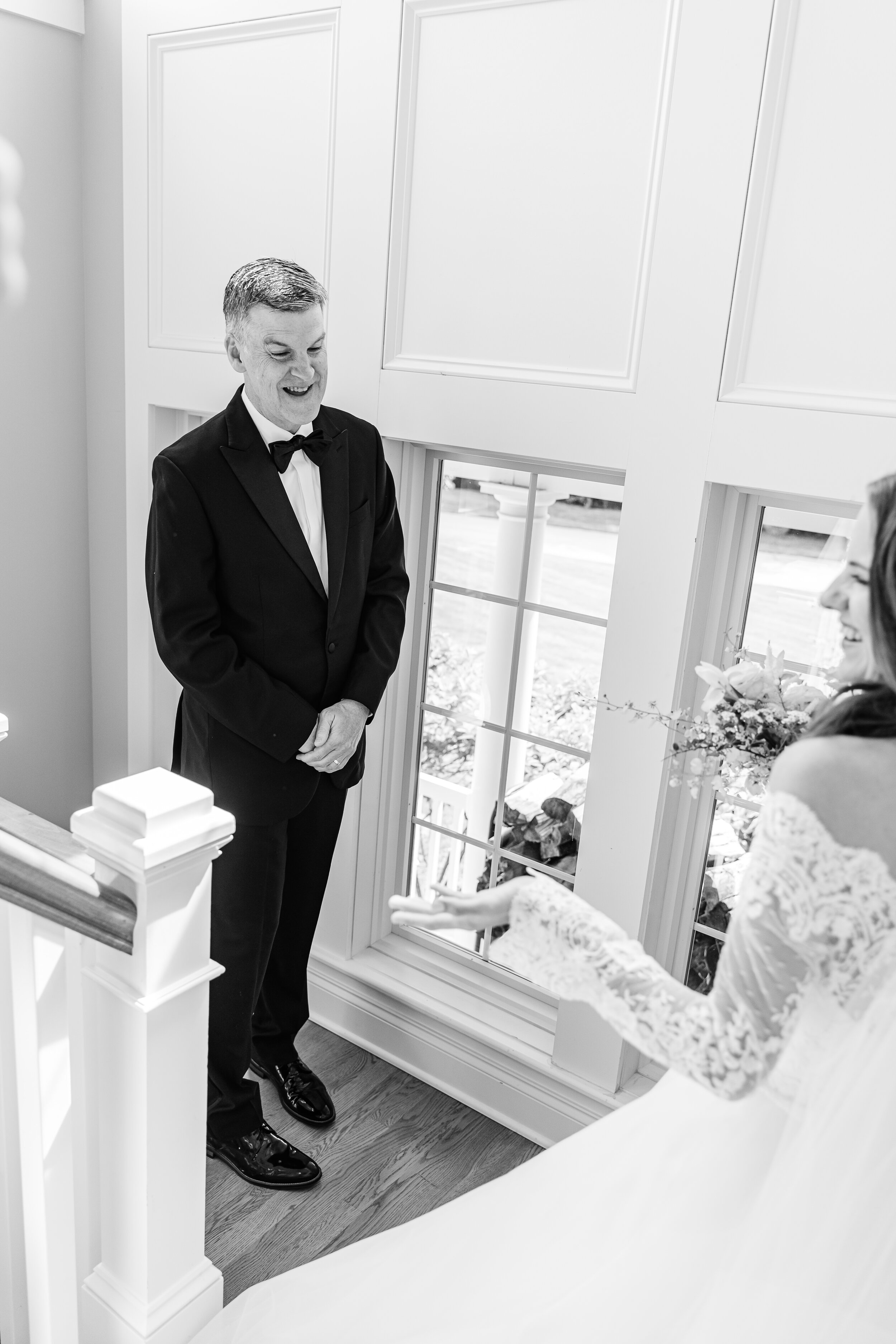 Intimate first look with classic bride and her father. 