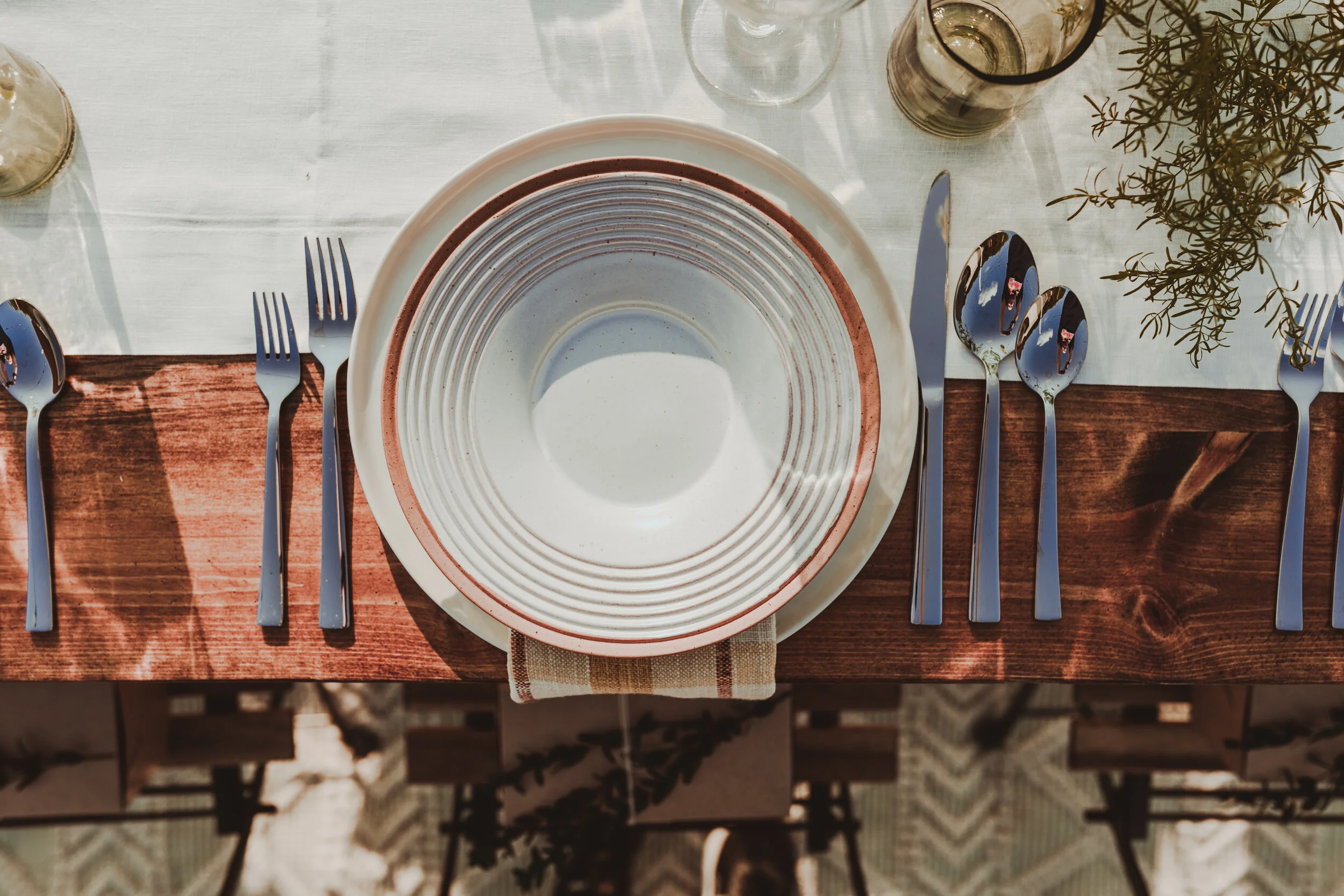 Minimal and Textured Tablescape Designed and Styled by Wildly Collective, Inspired by the Nostalgia of Picnics in a Meadow. The Wild and Relaxed Floral Arrangements are all Seasonal Florals and Locally Sources, Designed using the most Sustainable Fl…