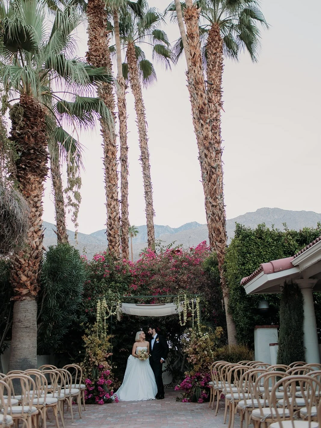 A chuppah and floral install by @stillcarnations that paired perfectly with the Palm Springs backdrop. 

Planning &amp; Design: @wildlycollective_ 
Photography: @west_is_indigo 
Venue &amp; Catering: @villaroyale_palmsprings 
Florist: @stillcarnation
