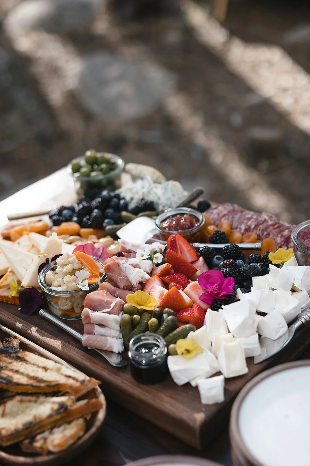 Charcuterie spread of cheese, meat, fruit