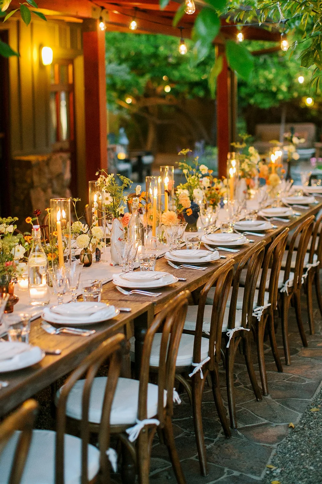 Florals and candles on dinner table