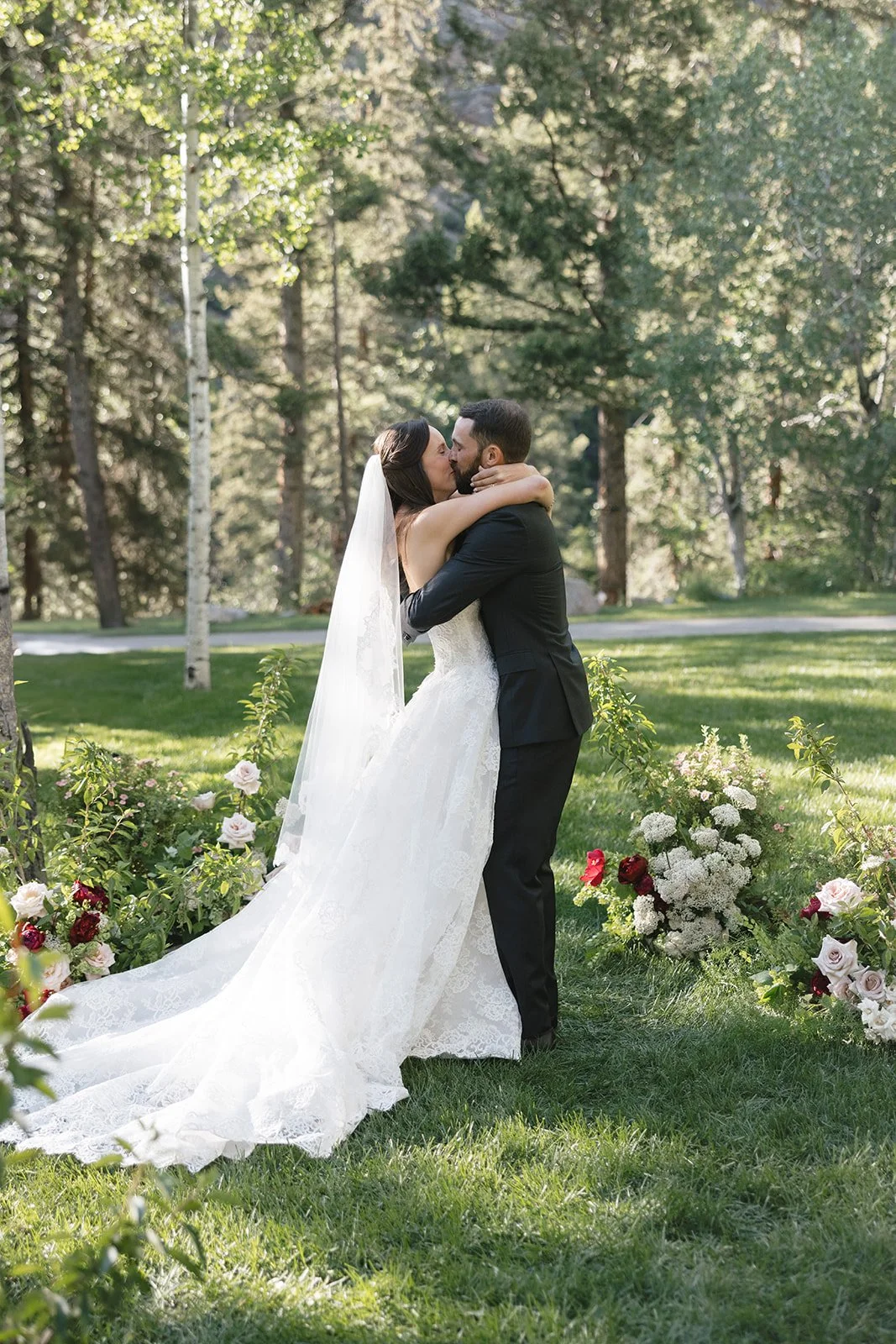 Bride and groom having their first kiss