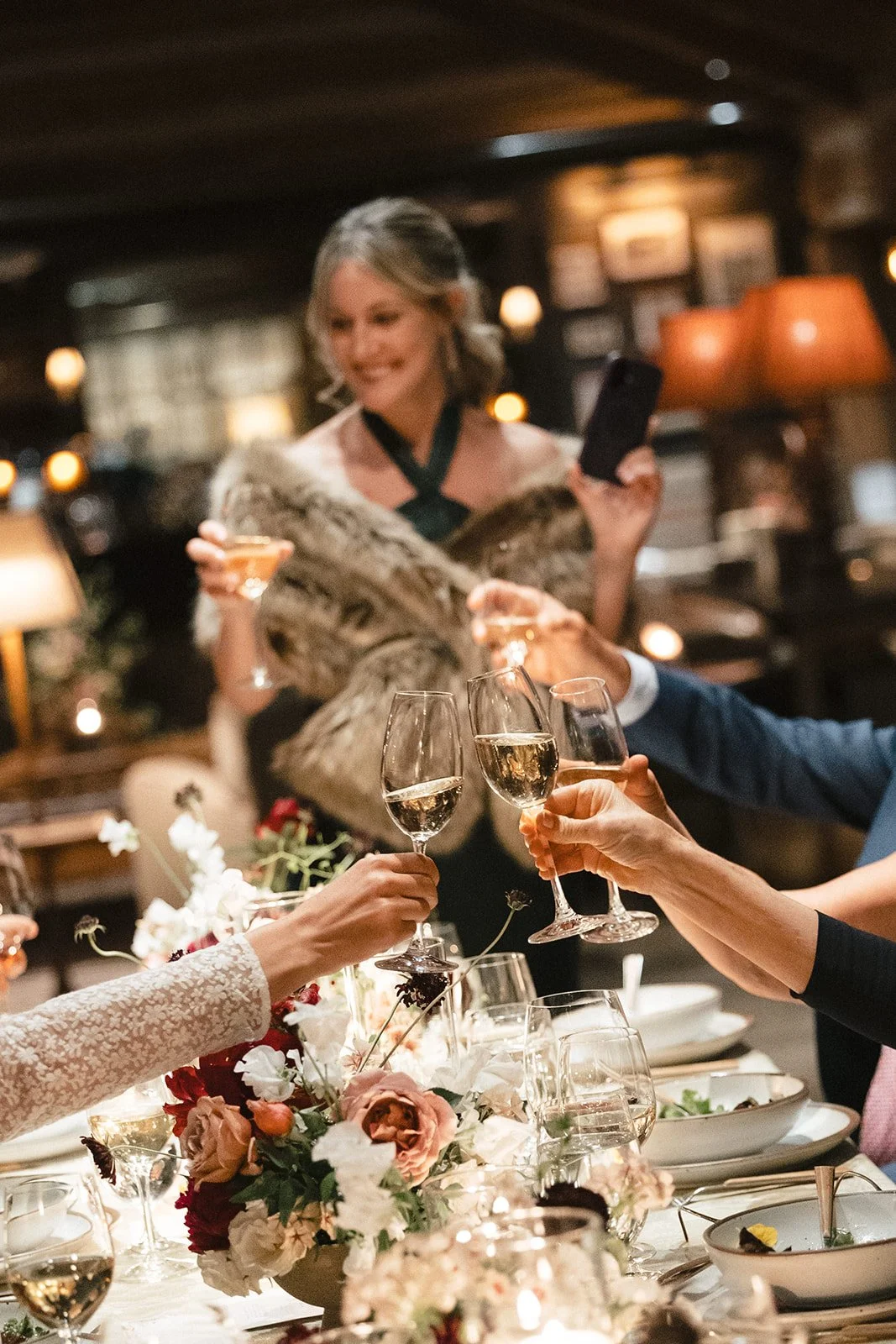 wedding guests toasting with champagne