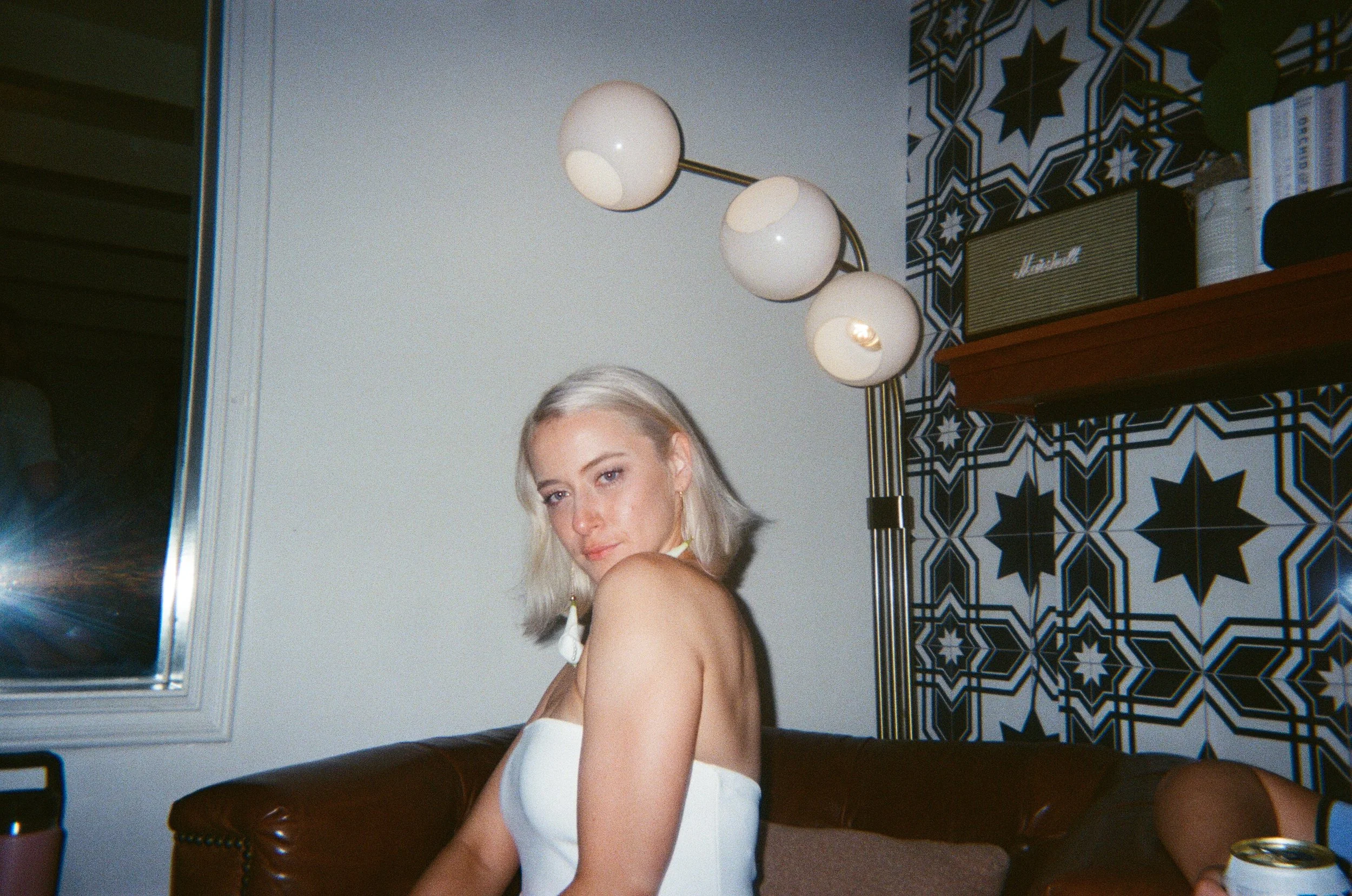 Bride looking over her shoulder at camera