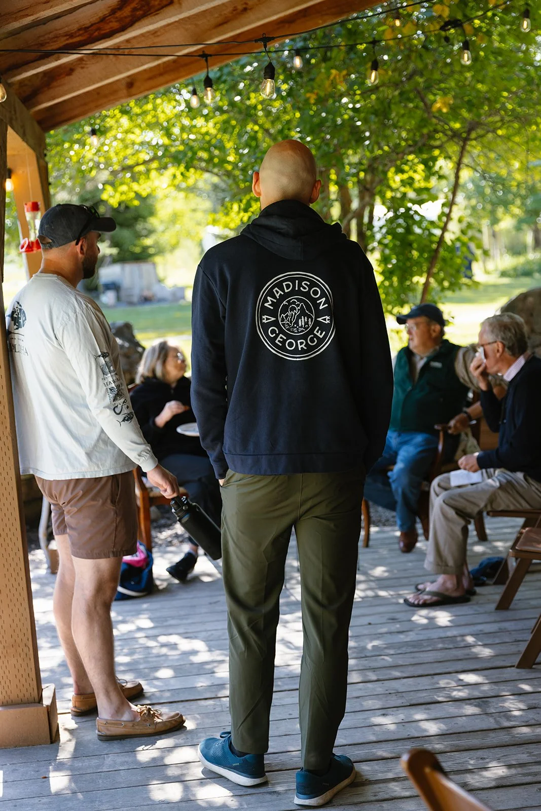 Wedding guests gathered around chatting