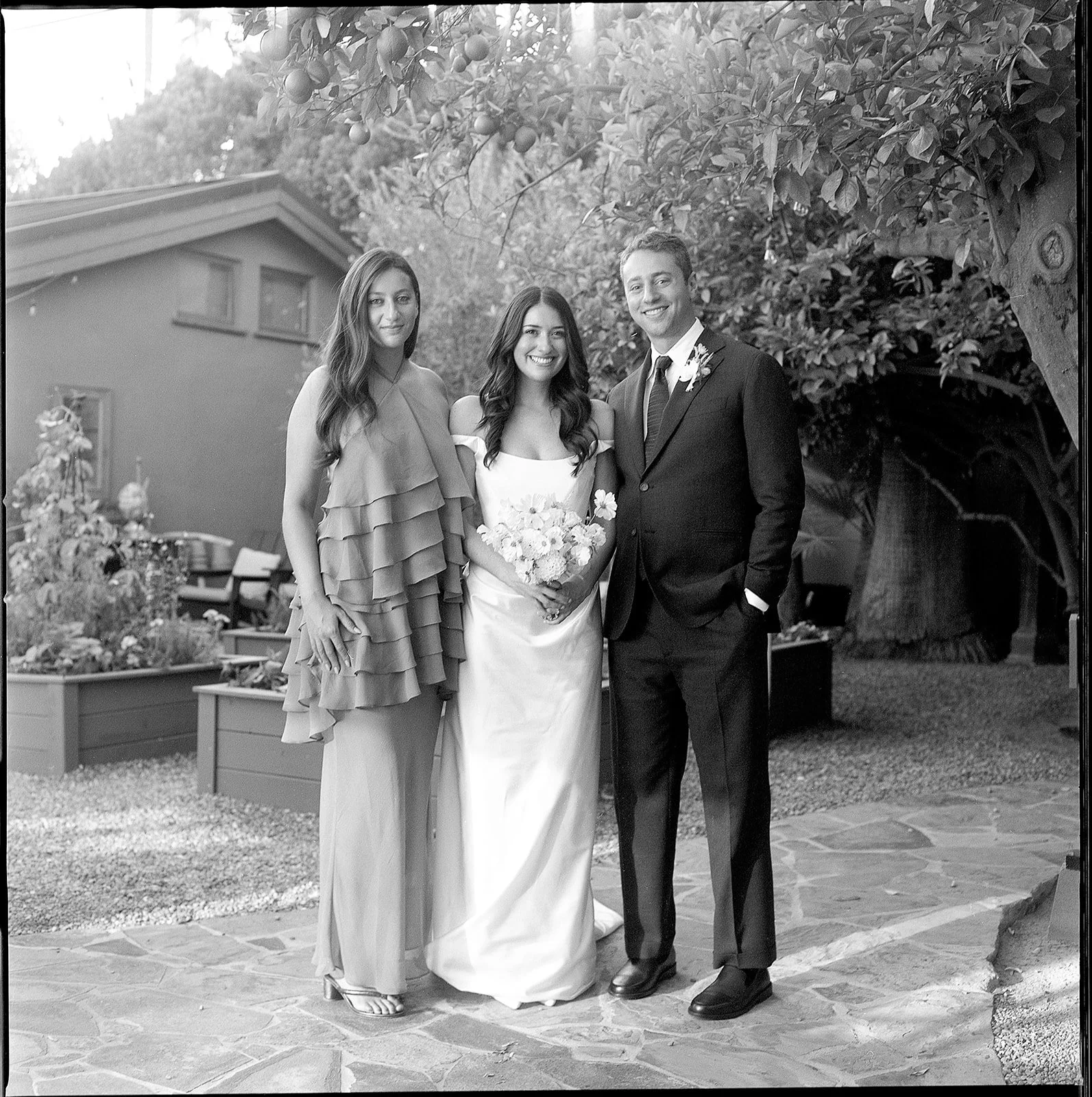 Bride and groom with family