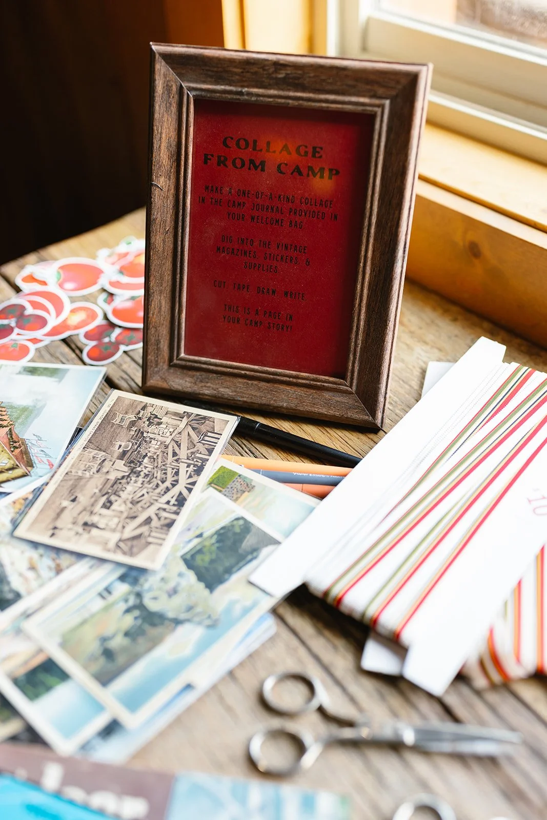 Collage activity sign with supplies around it