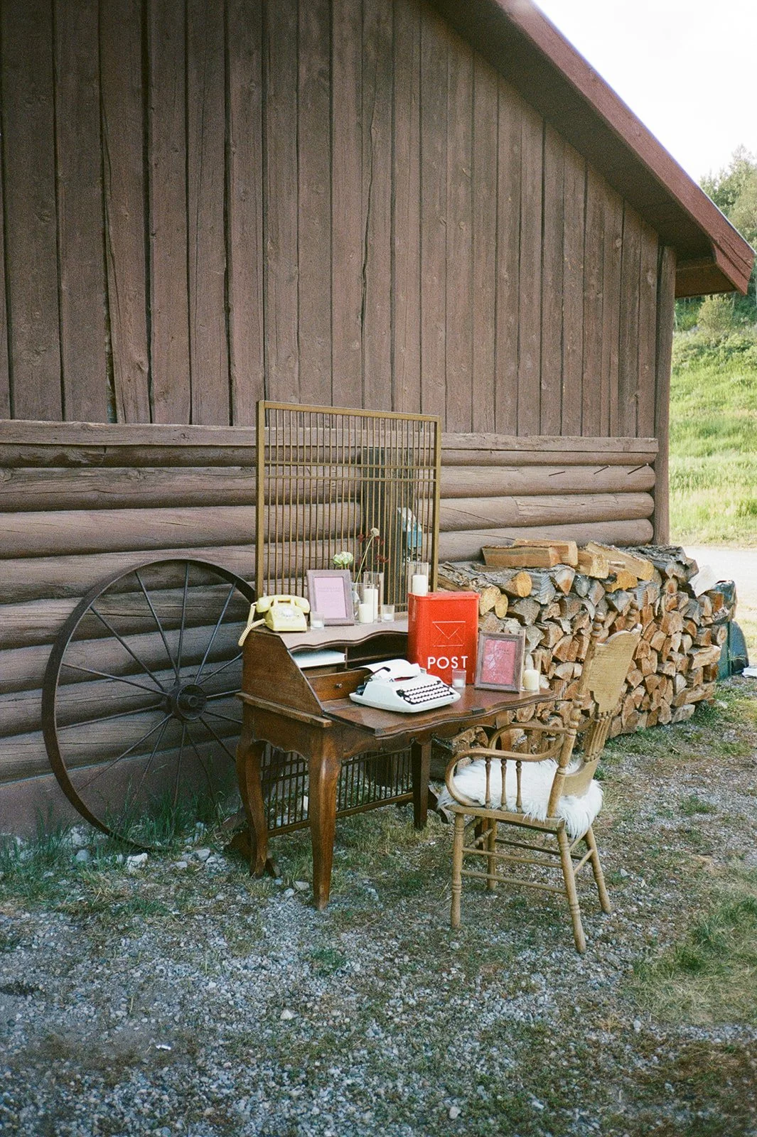 Welcome desk with typewriter in front of barn