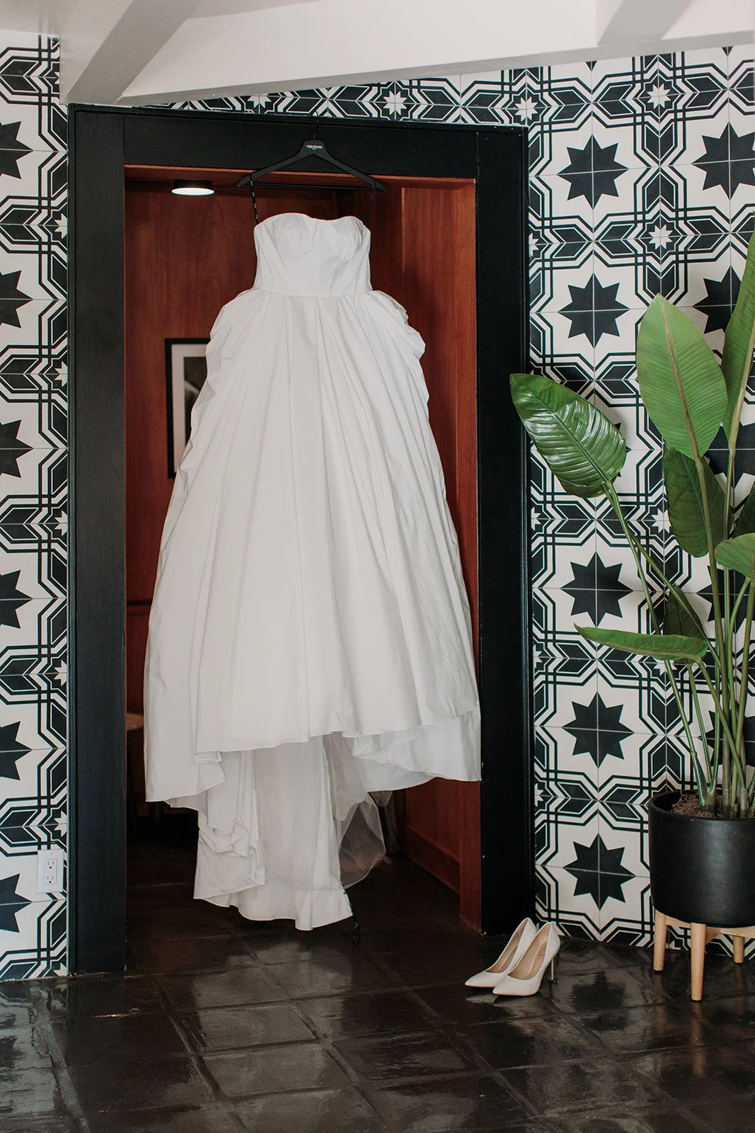 Wedding dress hanging on the door