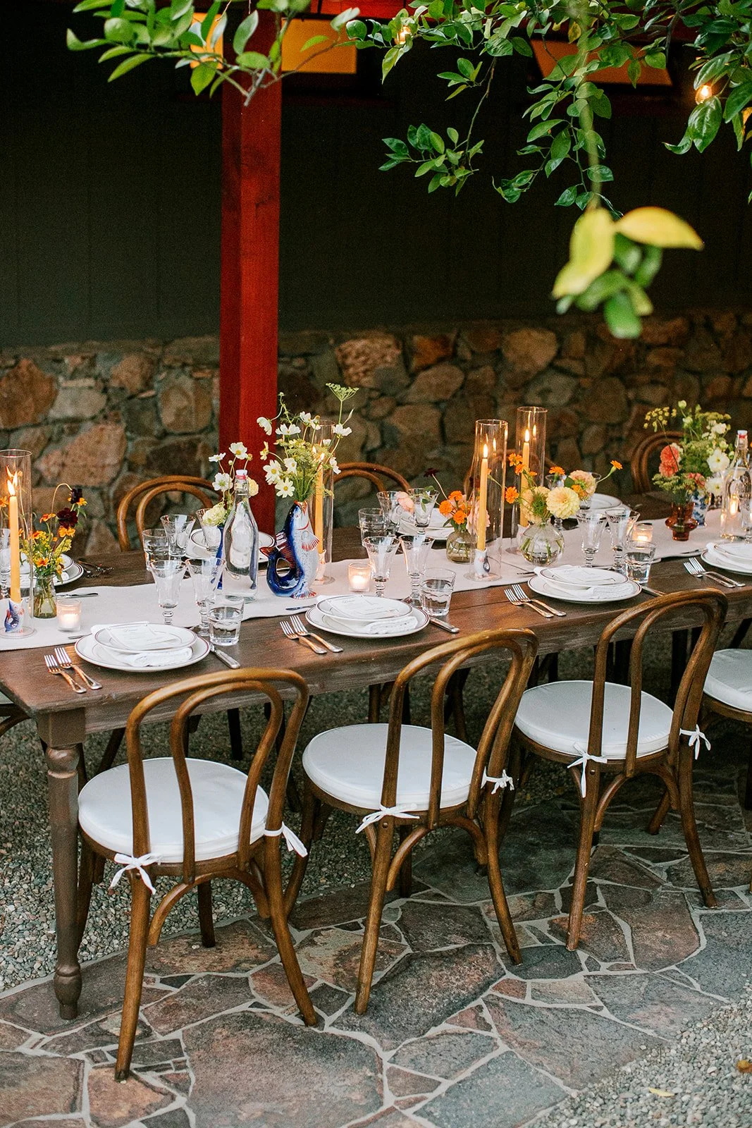 Tables set for dinner with florals