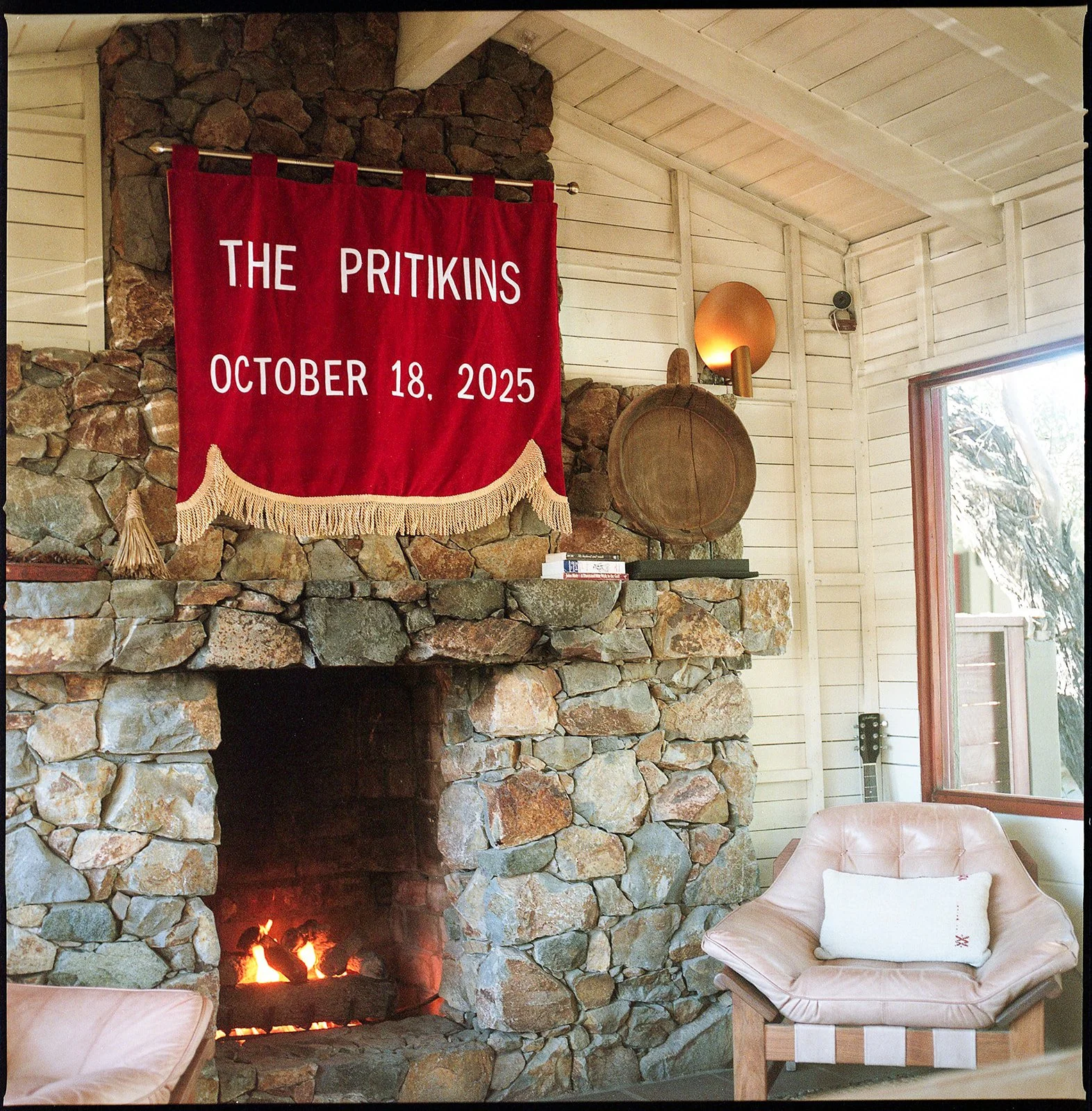 Welcome banner over fireplace