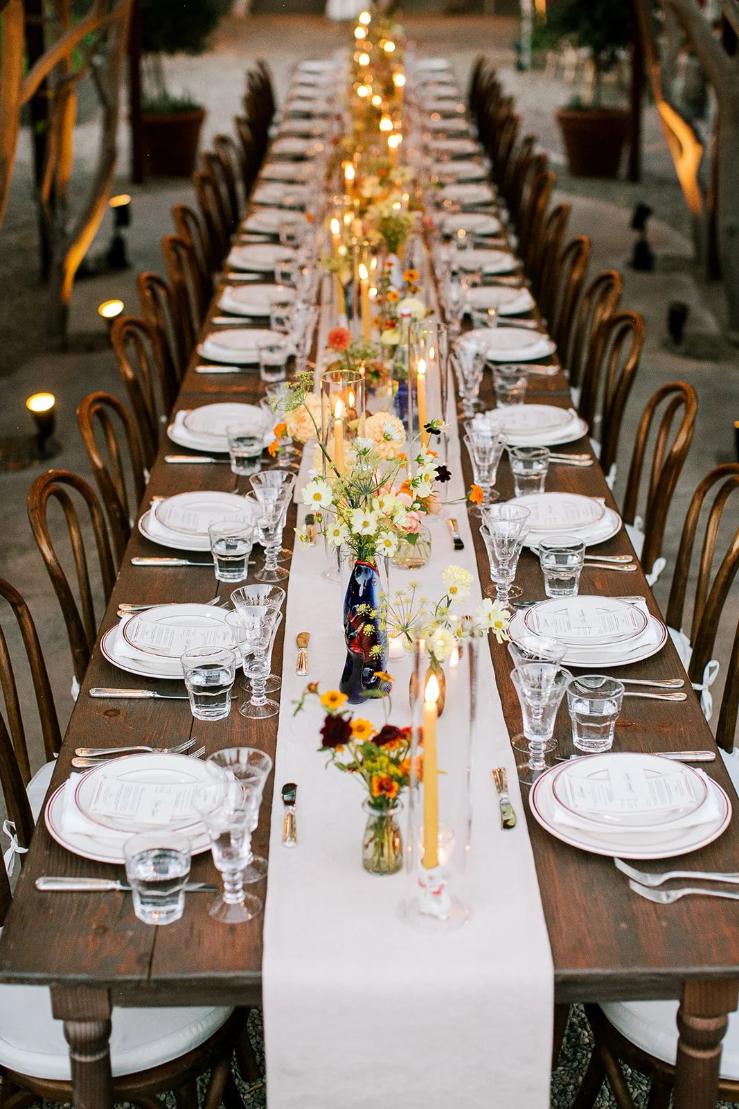 Table set with glassware and florals