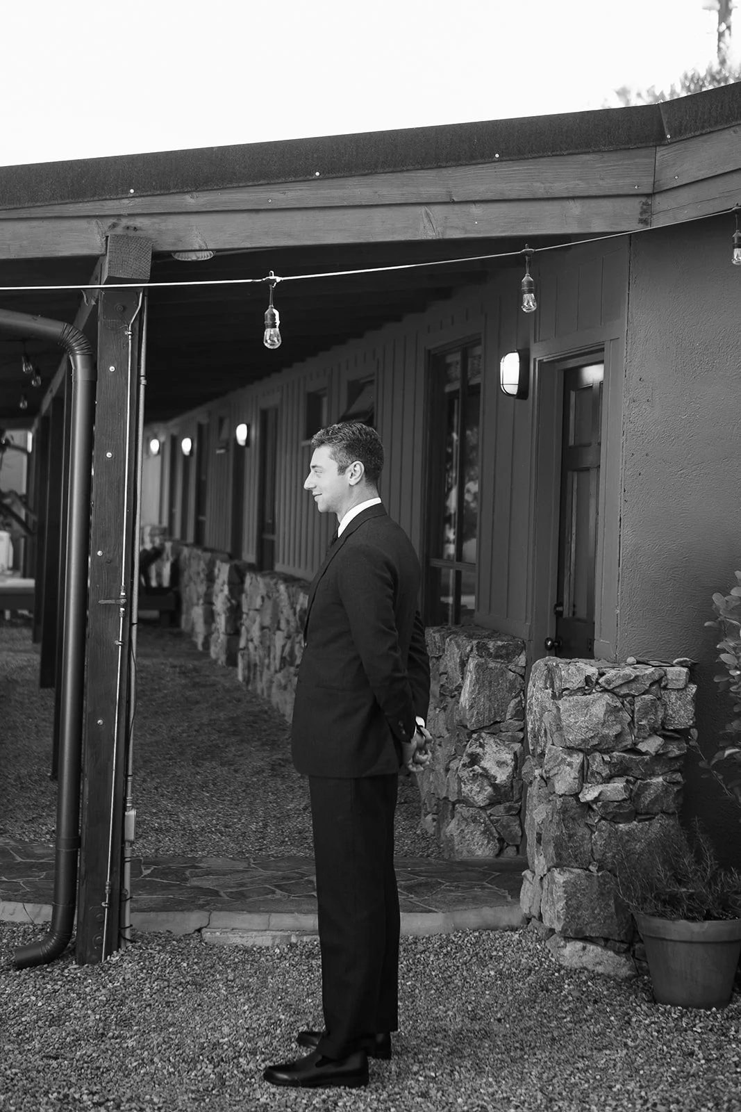 Profile of groom in his suit