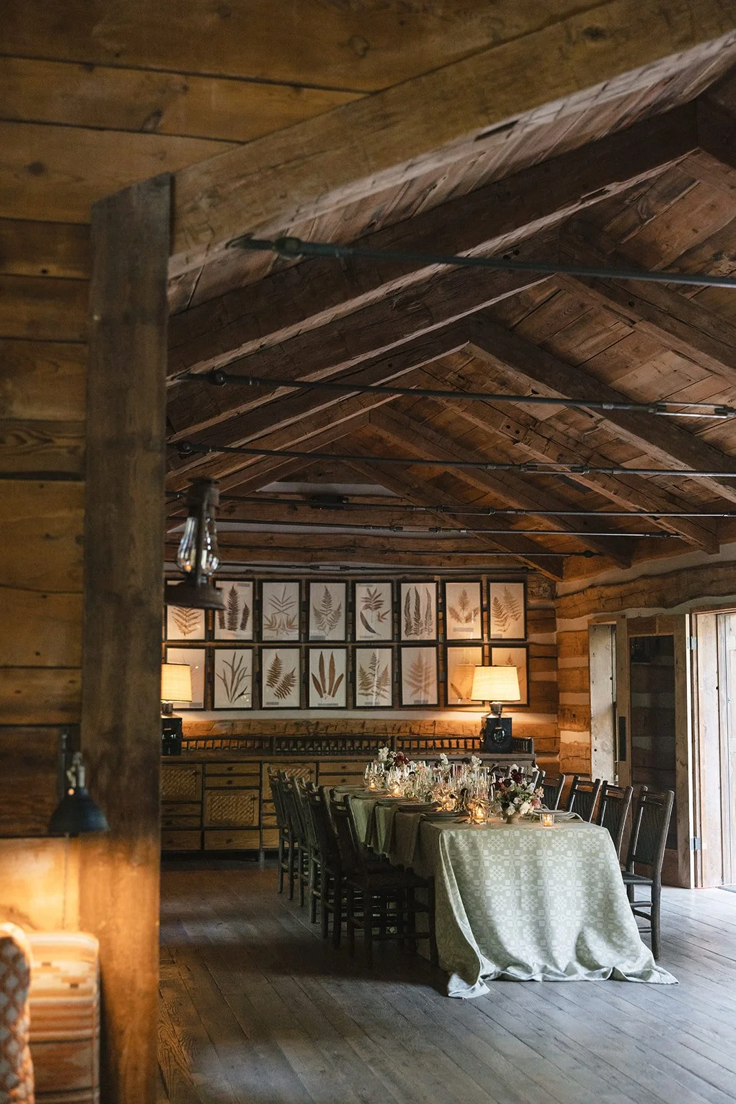 Reception table with candles lit inside cabin