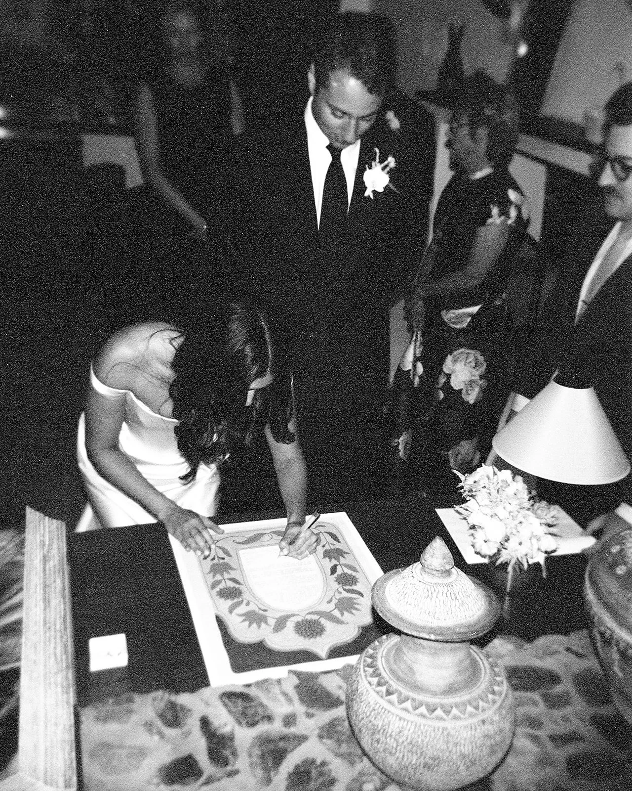 Bride signing ketubah