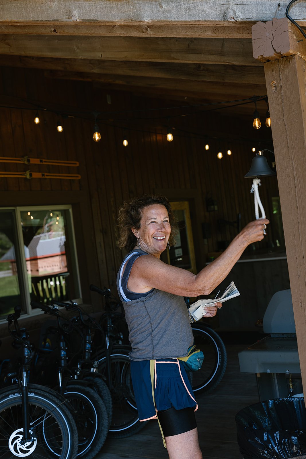 Wedding guest ringing bell in cabin