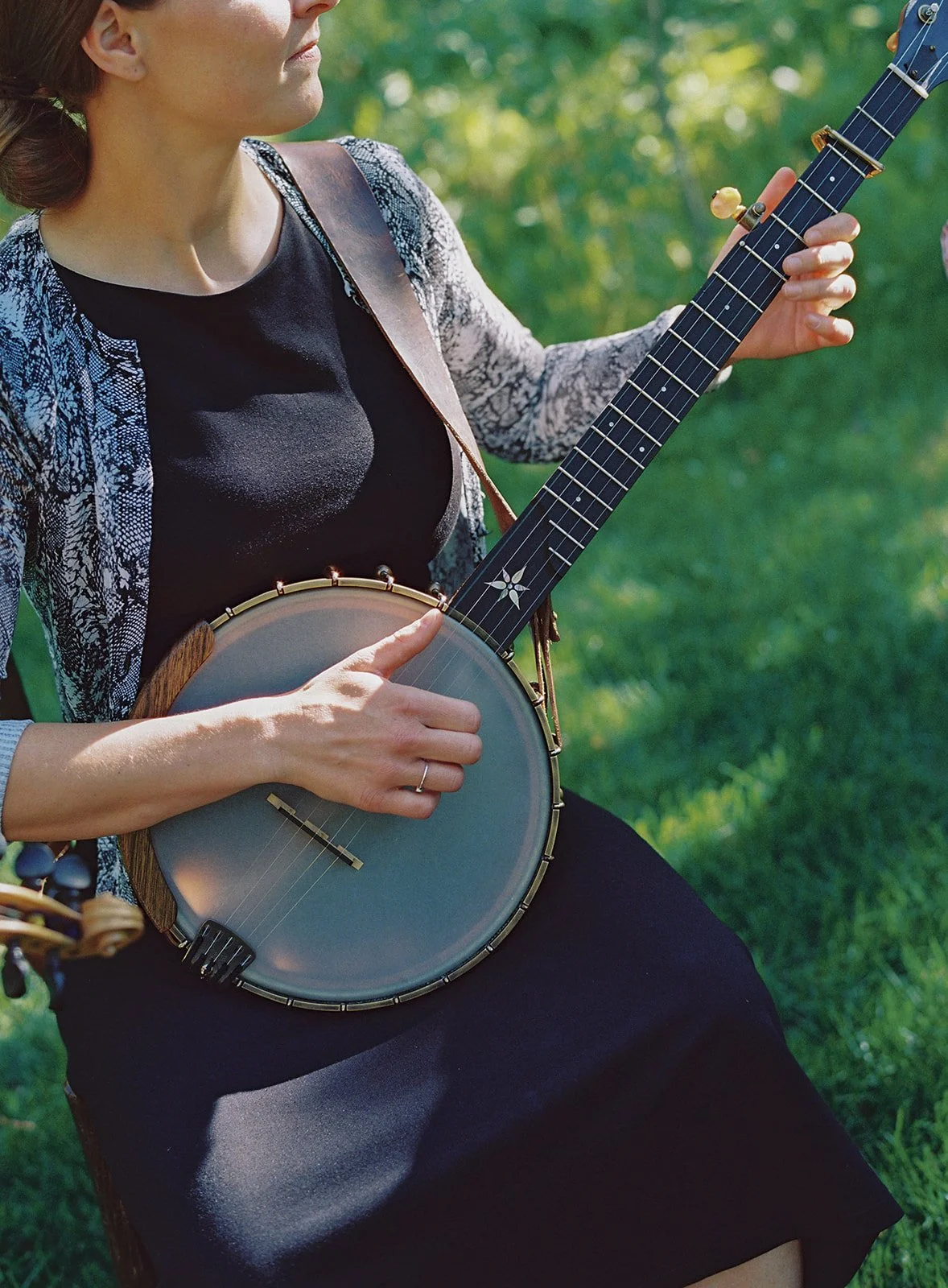 Banjo player playing outside