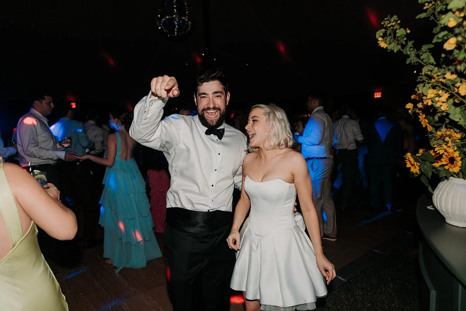 Bride and groom dancing at reception
