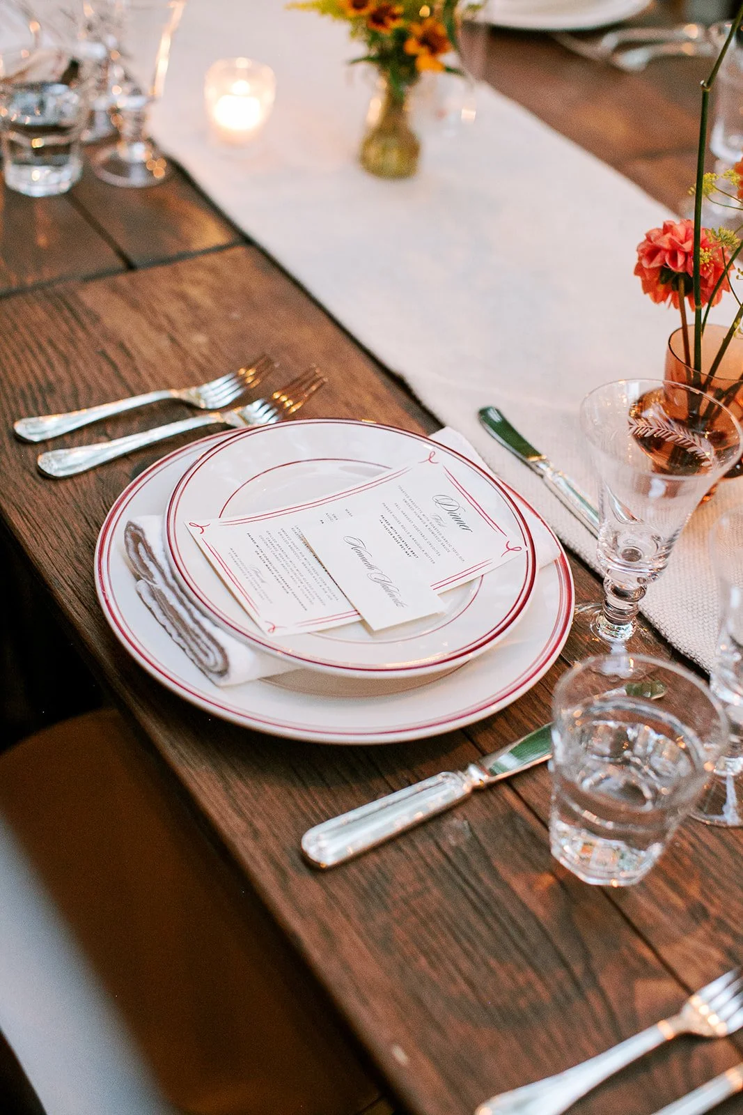 Menu with name card on dinner plates