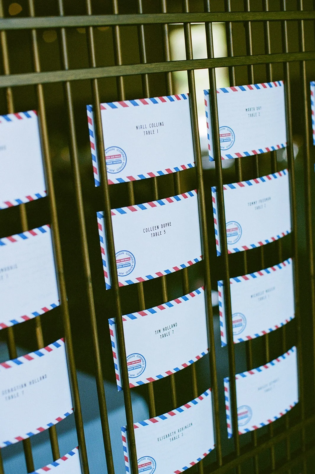 Letters as place cards hanging on screen