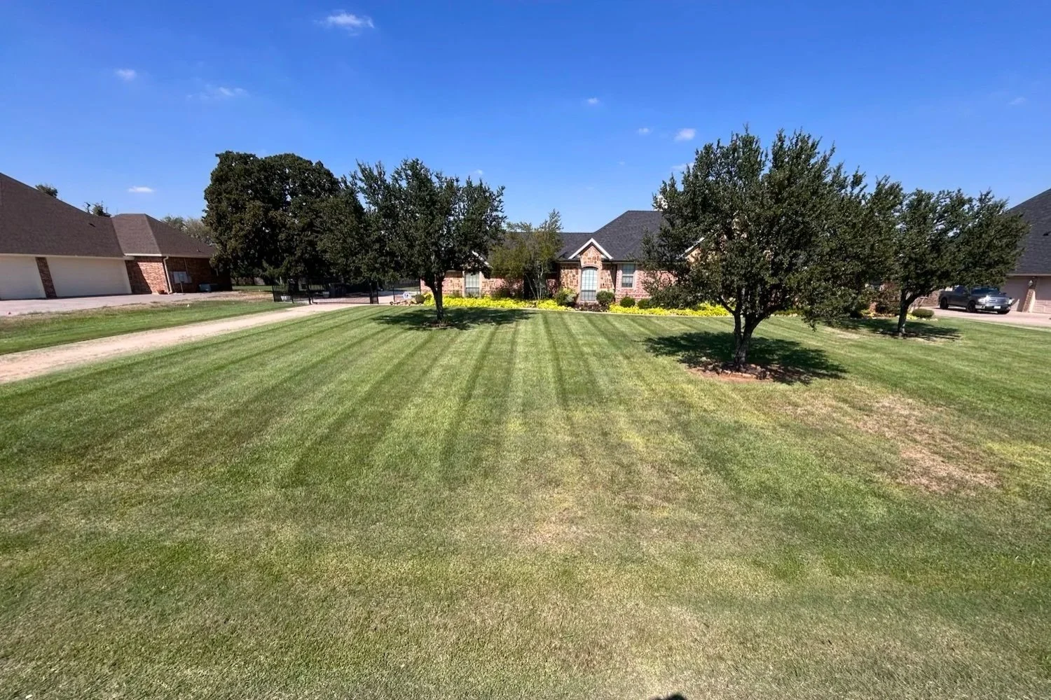 Striped lawn mowed by Leatherneck Landscaping in Mansfield TX