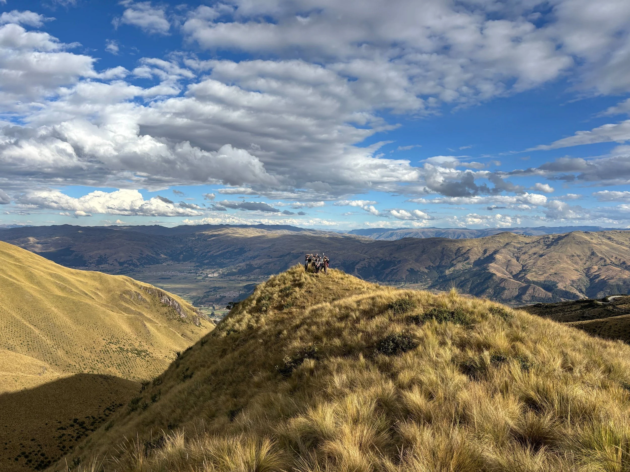 Students overlooking the Andean highlands in the Zurite program brochure