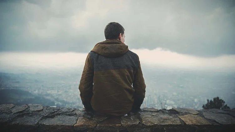 Boy+on+Ledge.jpeg