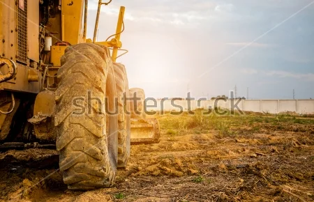 stock-photo-heavy-machinery-working-at-construction-site-1030762246.jpg