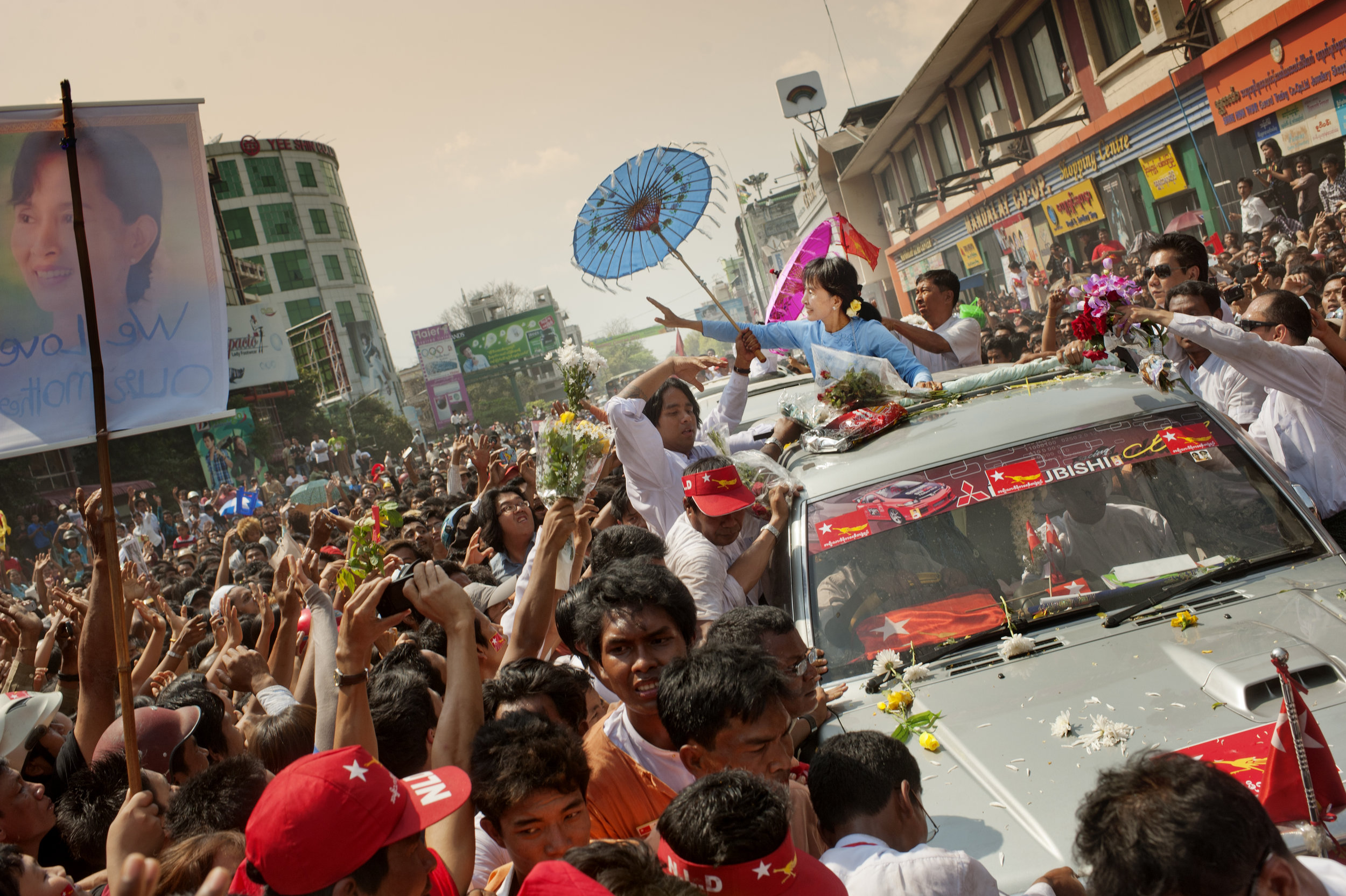  Aung San Suu Kyi, is greeted on the streets of Mandalay for the upcoming parliamentary seats election / Burma - 2012 