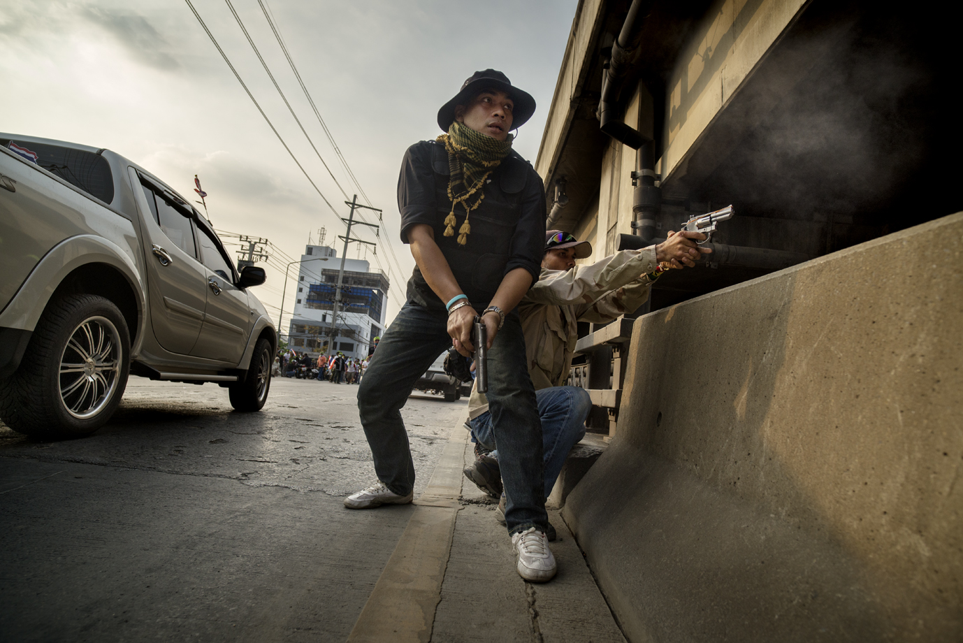  Protesters fire guns against oppositional crowd, Bangkok / Thailand -2014 