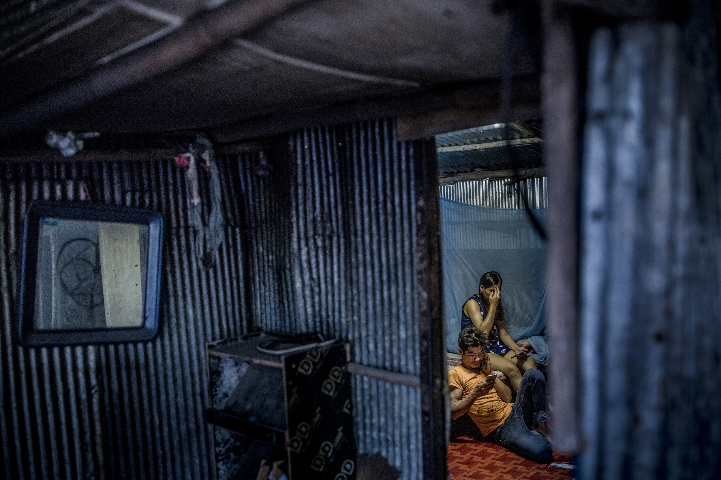  Burmese migrant workers are being housed in a labor camp that has slum-like conditions, Chaing Mai / Thailand- 2019 