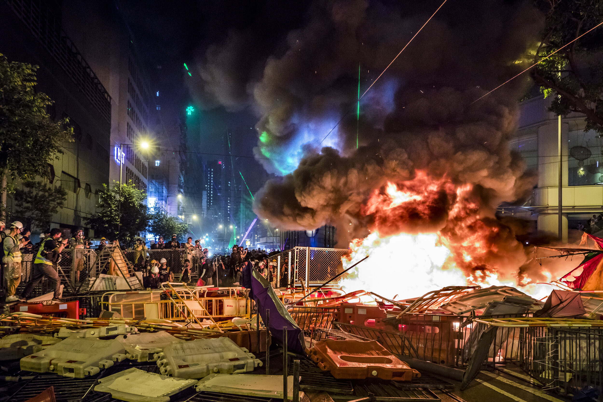  Protesters set fire to a barricade during protests in the financial district in downtown Hong Kong-2019. 