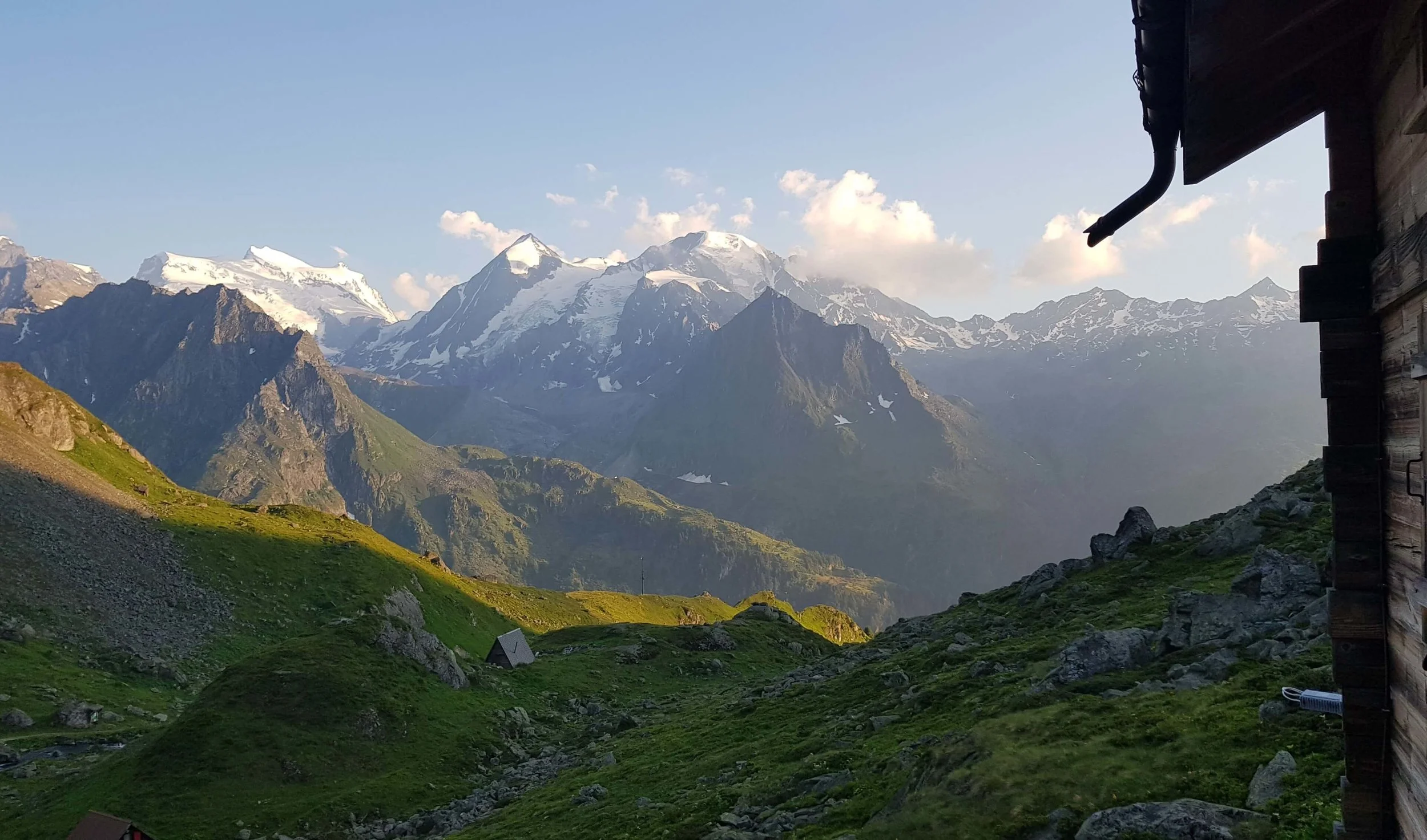 Walker’s Haute Route Accommodation - View of the Grand Combin range from the remote alpine hut of Cabane de Louvie.